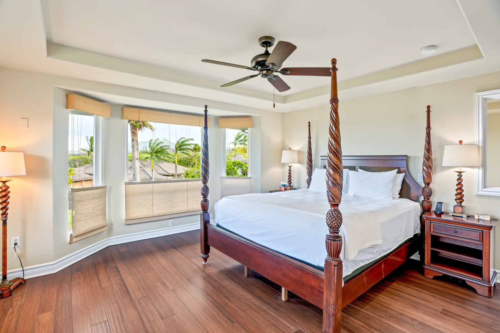 Princeville Vacation Rentals, Hale Hau'oli Moku - Afternoon light through the bay windows makes the primary suite an easy place for a nap.