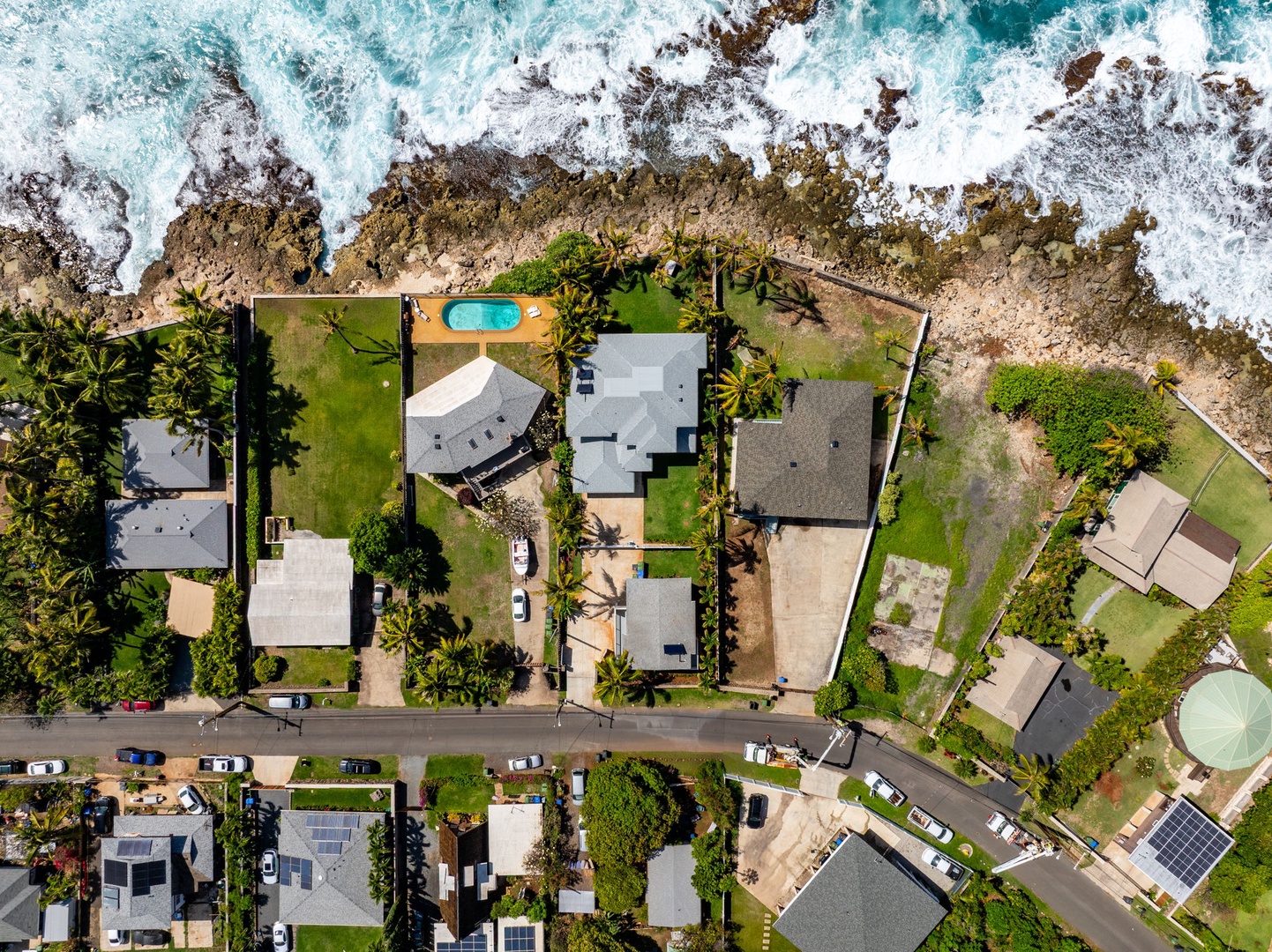 Waianae Vacation Rentals, Oceanfront Luxury Dream Estate - Direct overhead view reveals the home’s full layout, backyard, and proximity to the water’s edge.