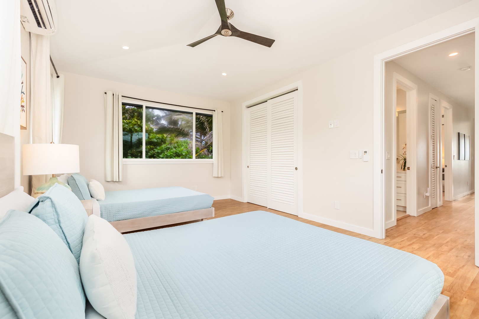 Laie Vacation Rentals, Majestic Mahakea Oceanfront Oasis - Guest fourth guest bedroom designed with two comfortable beds and a relaxing atmosphere.