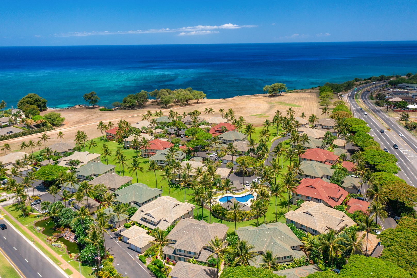 Kapolei Vacation Rentals, Kai Lani Luxury 6D - Stunning aerial view showcasing the Kai Lani community, with easy access to pristine beaches and scenic ocean views.