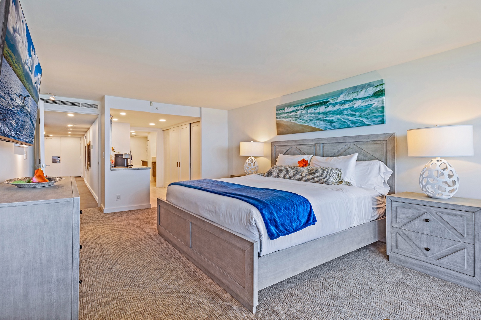 Lahaina Vacation Rentals, Kaanapali Shores 702 - The spacious primary bedroom offers a king-sized bed and relaxing ambiance, perfect for unwinding after a day of adventure.