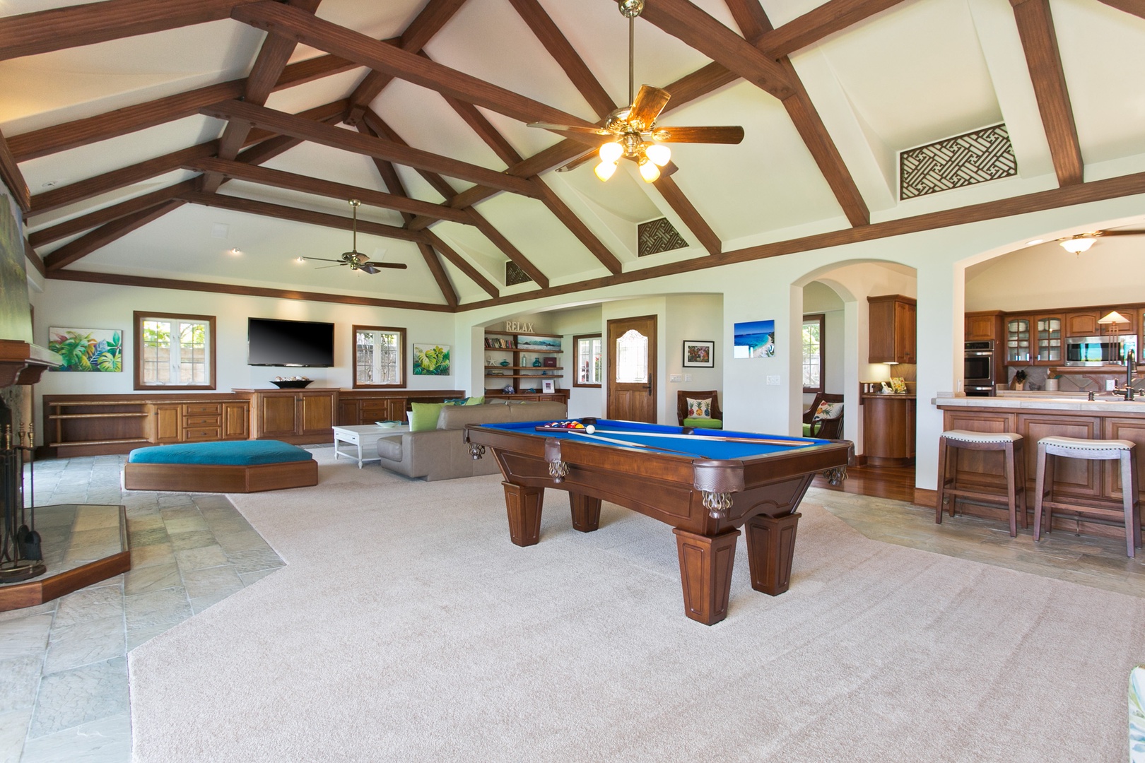 Kailua Vacation Rentals, Hale Melia* - Play, relax, and entertain in a spacious game room that opens up to the beauty of the beachfront.