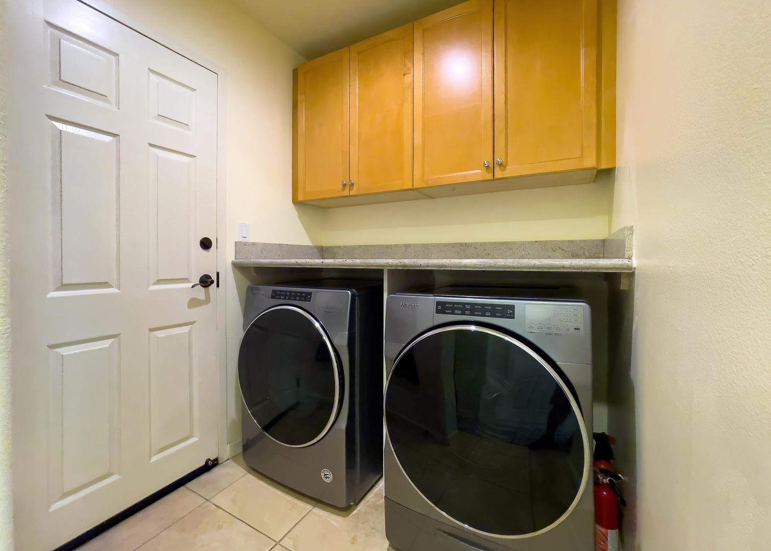 Kamuela Vacation Rentals, Mauna Lani Fairways #204 - Dedicated laundry room with full-size washer and dryer—perfect for extended stays or post-beach refreshes.