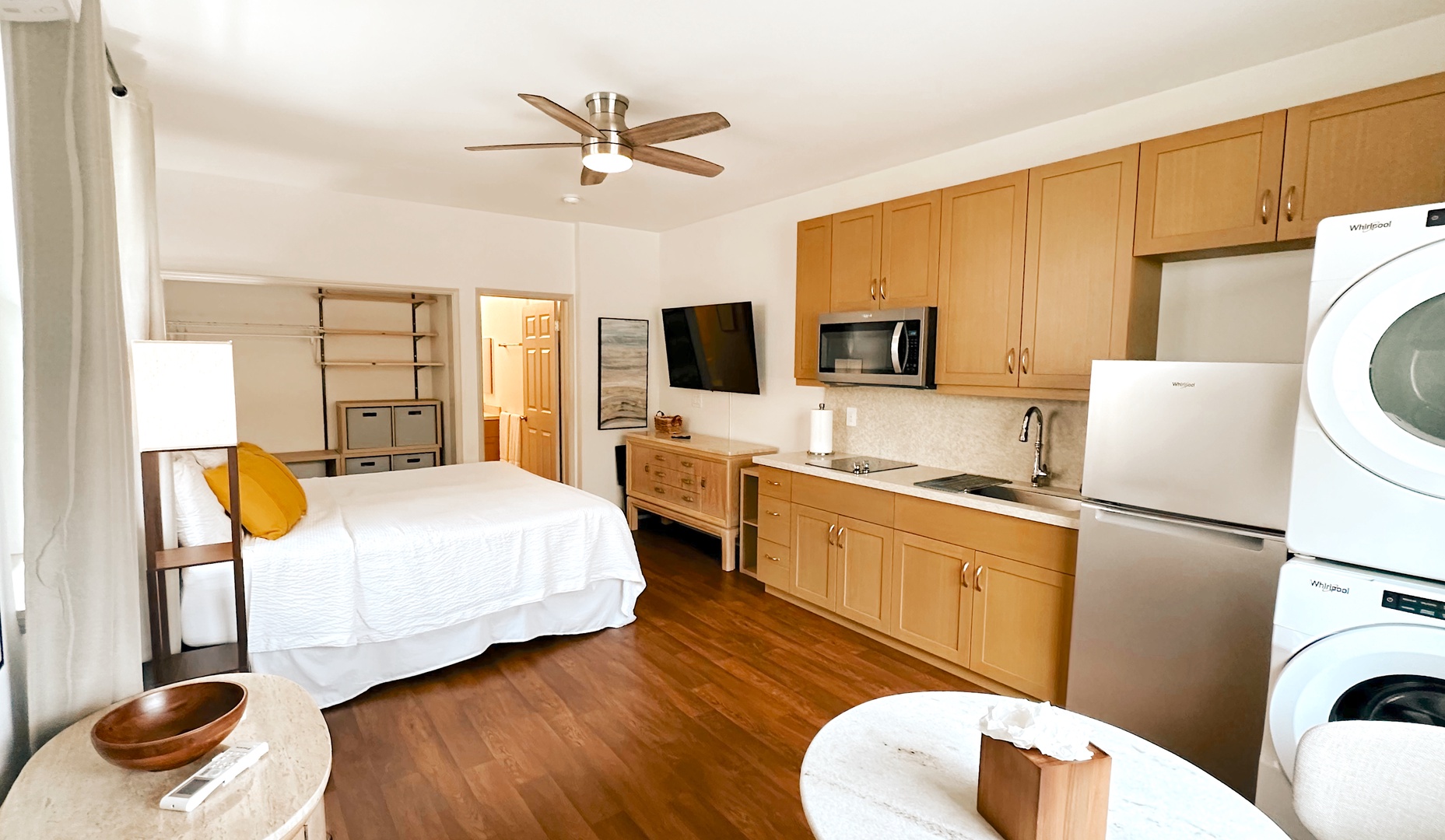 Makaha Valley Vacation Rentals, Makaha Valley Hale Kai** - Studio-style suite with king bed, kitchenette, and private seating area.