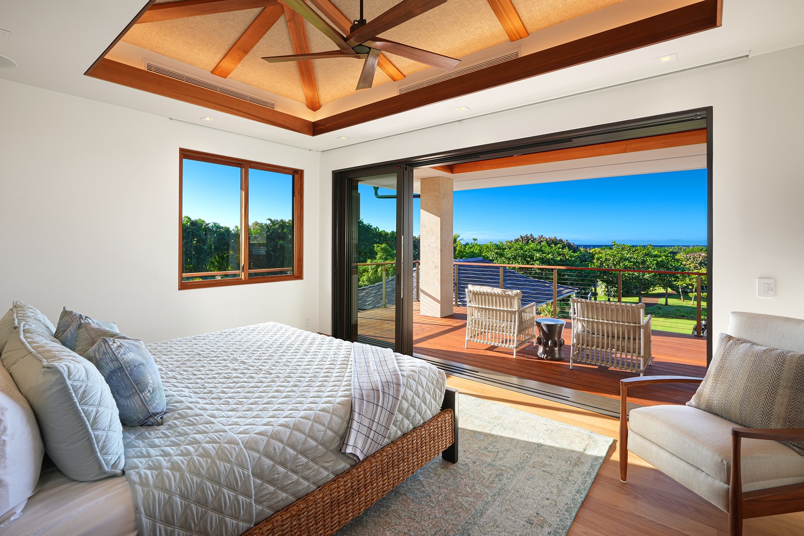 Koloa Vacation Rentals, Hale Kai'Opua - Wake up to ocean views from the primary bedroom with a king-sized bed, complete with a private lanai.