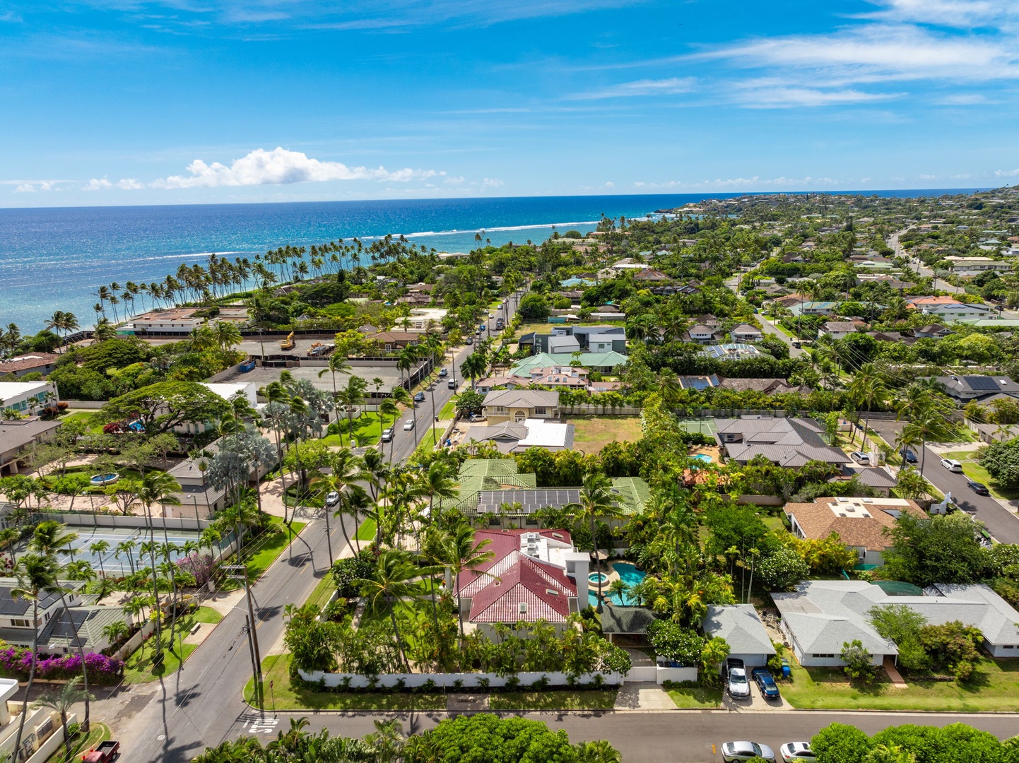 Honolulu Vacation Rentals, Kahala Oasis - Aerial view showcasing the coastal neighborhood with views extending to the beautiful Hawaiian shoreline.