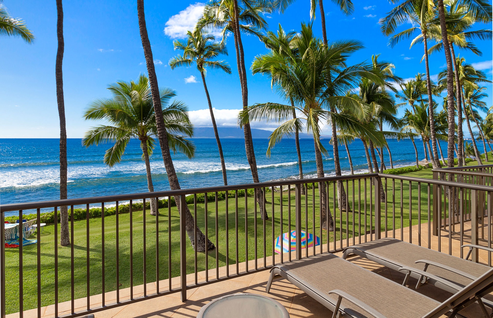 Lahaina Vacation Rentals, Puamana 240-3 - Delight in the ultimate beachfront experience with pristine views from the patio.