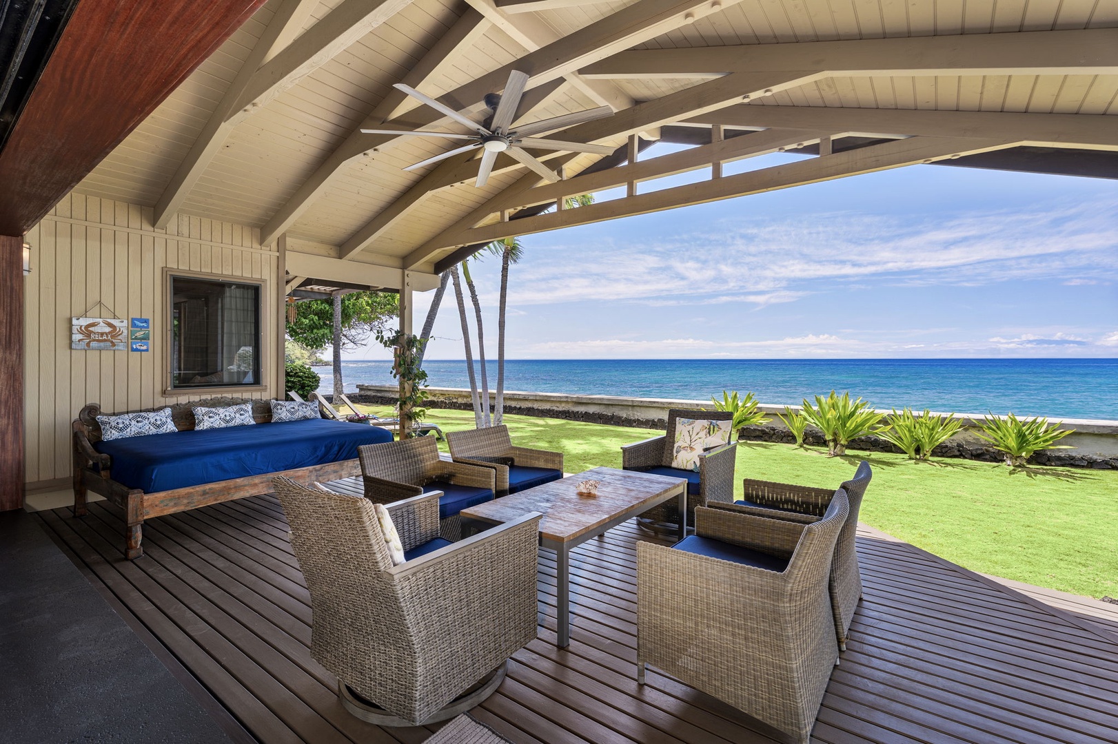Kamuela Vacation Rentals, Island Time Retreat - Daytime on the covered lanai, ocean stretched out past the railing.