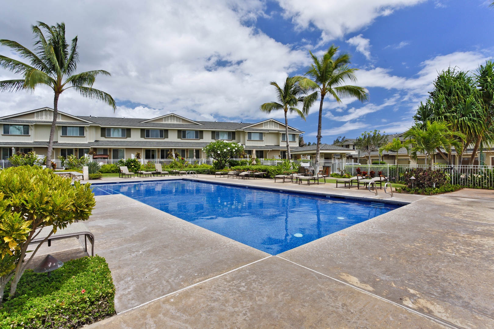 Kapolei Vacation Rentals, Hillside Villas 1538-2 - Take a dip or read your favorite book in the lounge chairs.