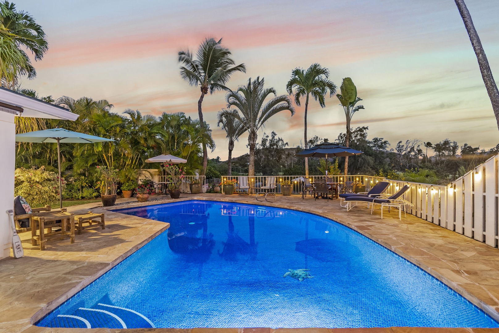 Kailua Vacation Rentals, Hale Aloha - Relax and unwind by the inviting pool, complemented by comfortable chaise lounges.