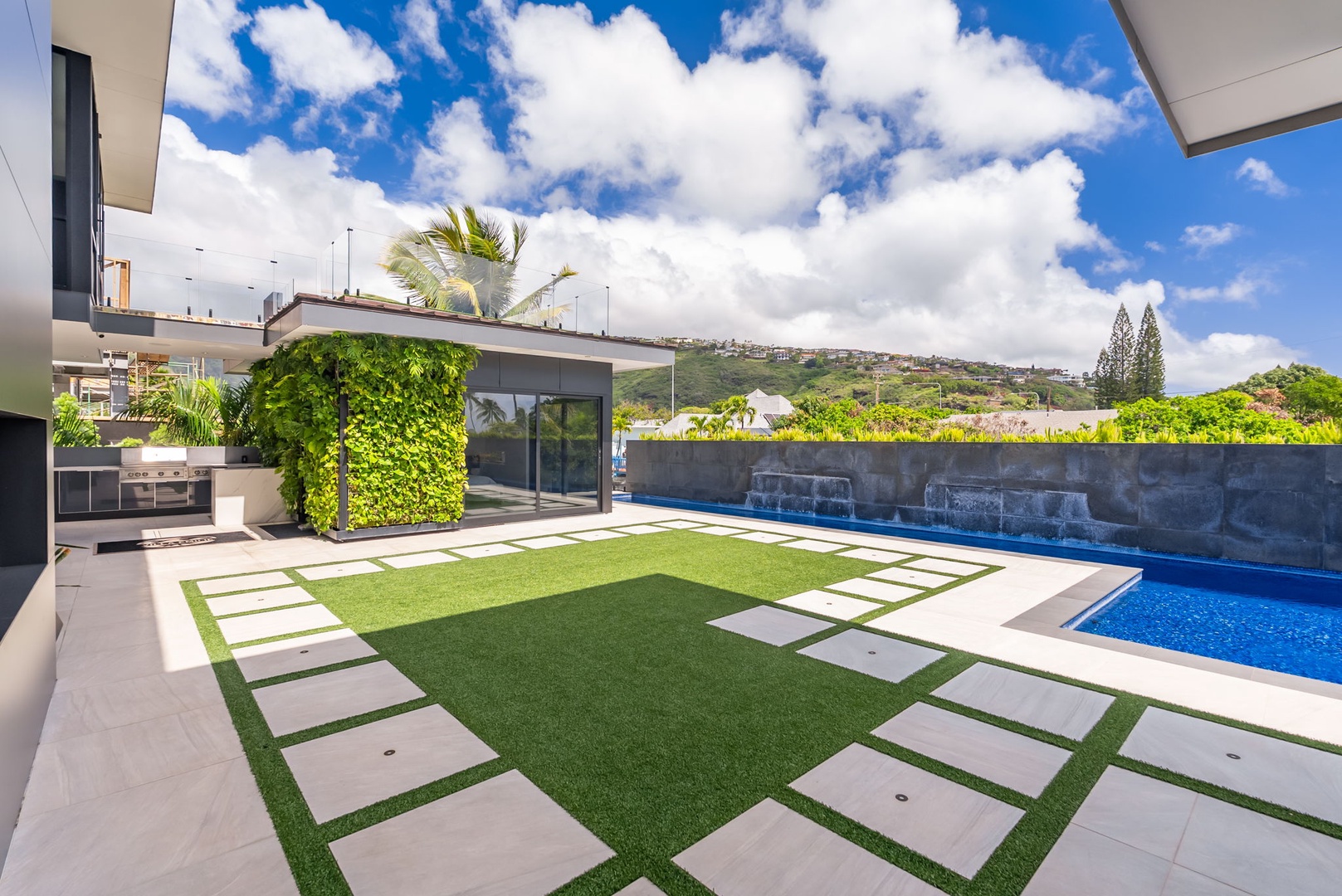 Honolulu Vacation Rentals, Ocean Villa Emilie - Step onto manicured greens with ocean-view edges—perfect for yoga at sunrise or a private moment under the palms.