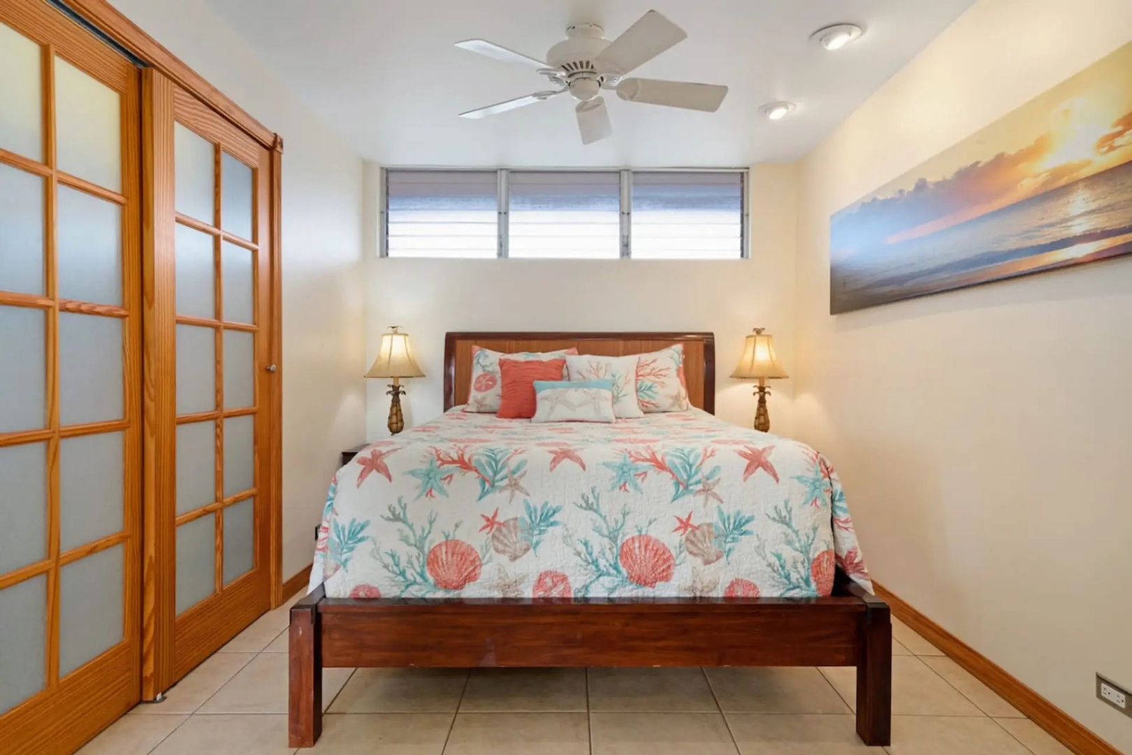 Kihei Vacation Rentals, Kalama Terrace P302 - Sink into the coral-print bed and sleep the way only a real vacation lets you.