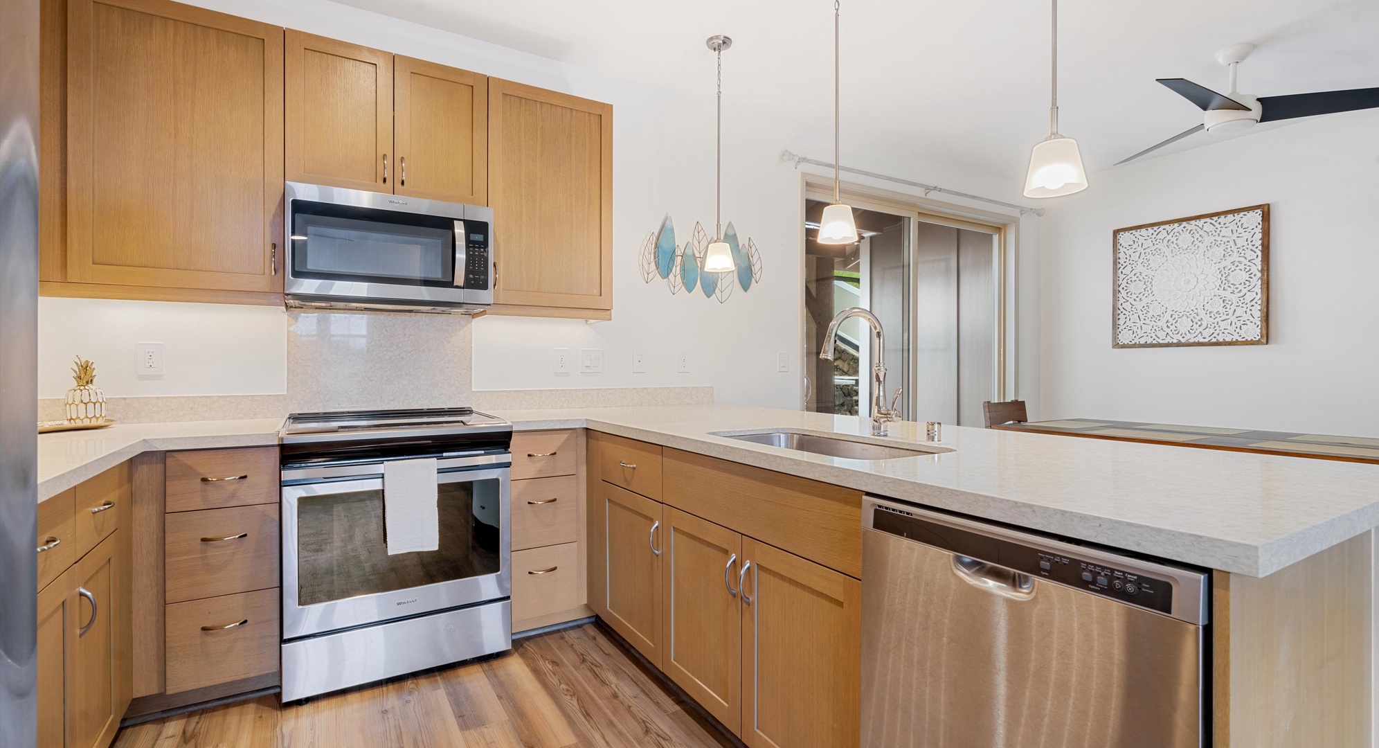 Makaha Valley Vacation Rentals, Makaha Valley Hale Kai** - Modern kitchen with stainless appliances and everything needed for home-cooked meals.