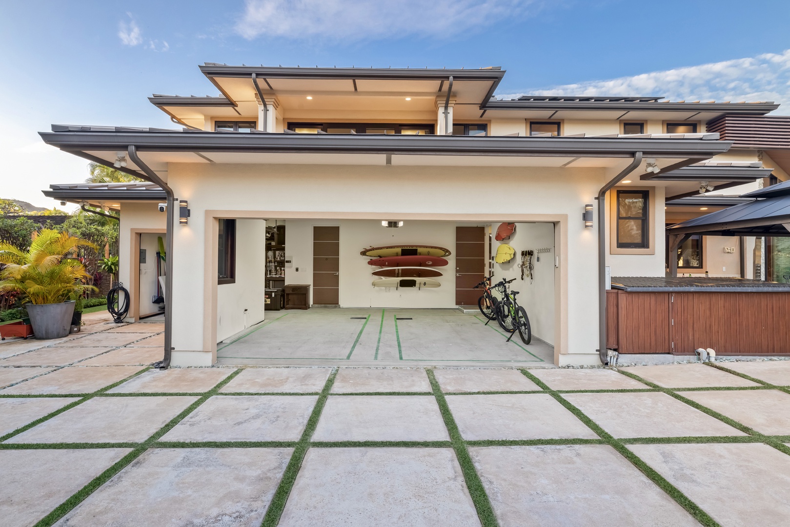 Honolulu Vacation Rentals, Kahala Grand Splendor - Modern home entrance with sleek architecture and lighting.