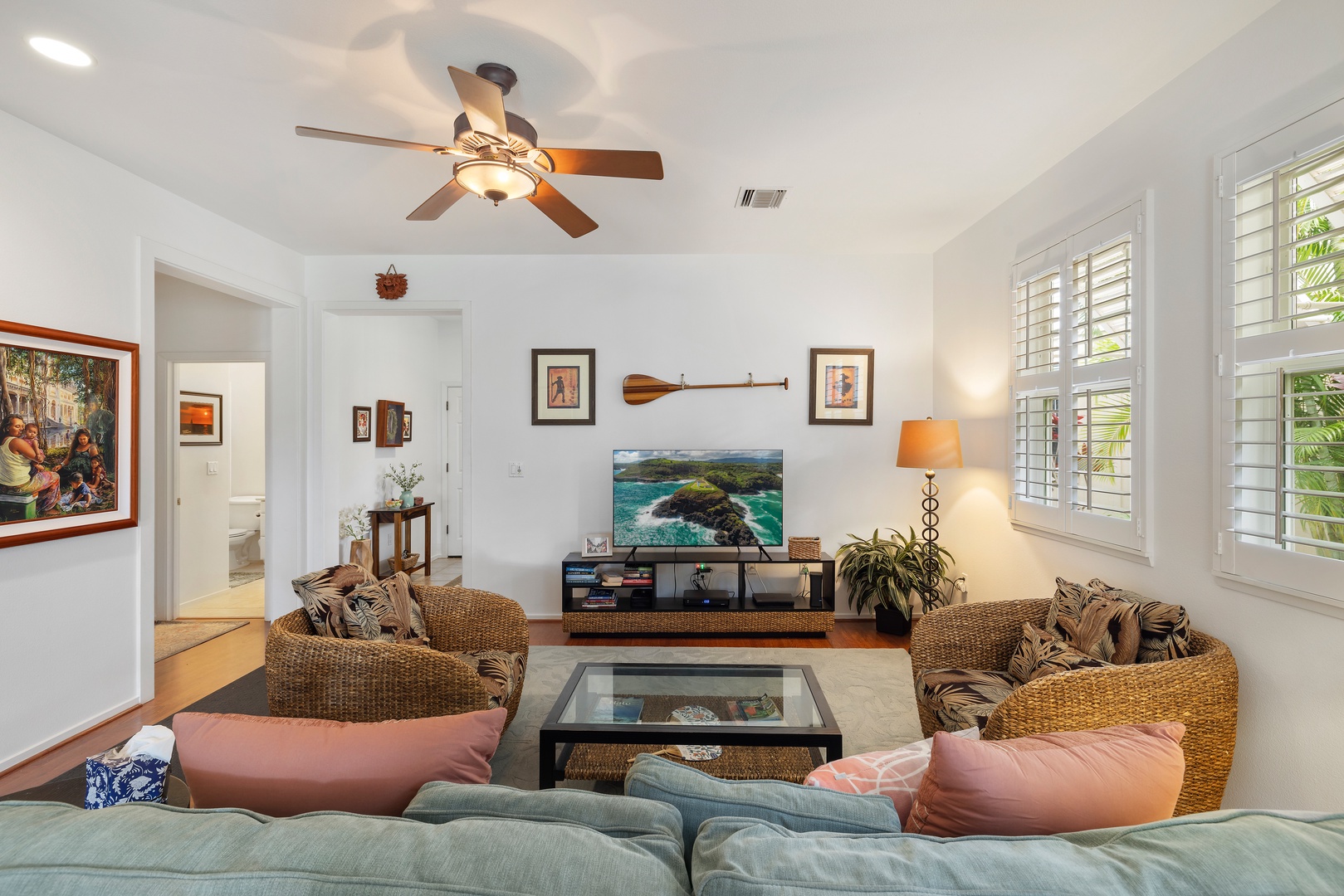 Kapolei Vacation Rentals, Coconut Plantation 1190-1 - The living area has a flat-screen TV, plush seating and central AC.
