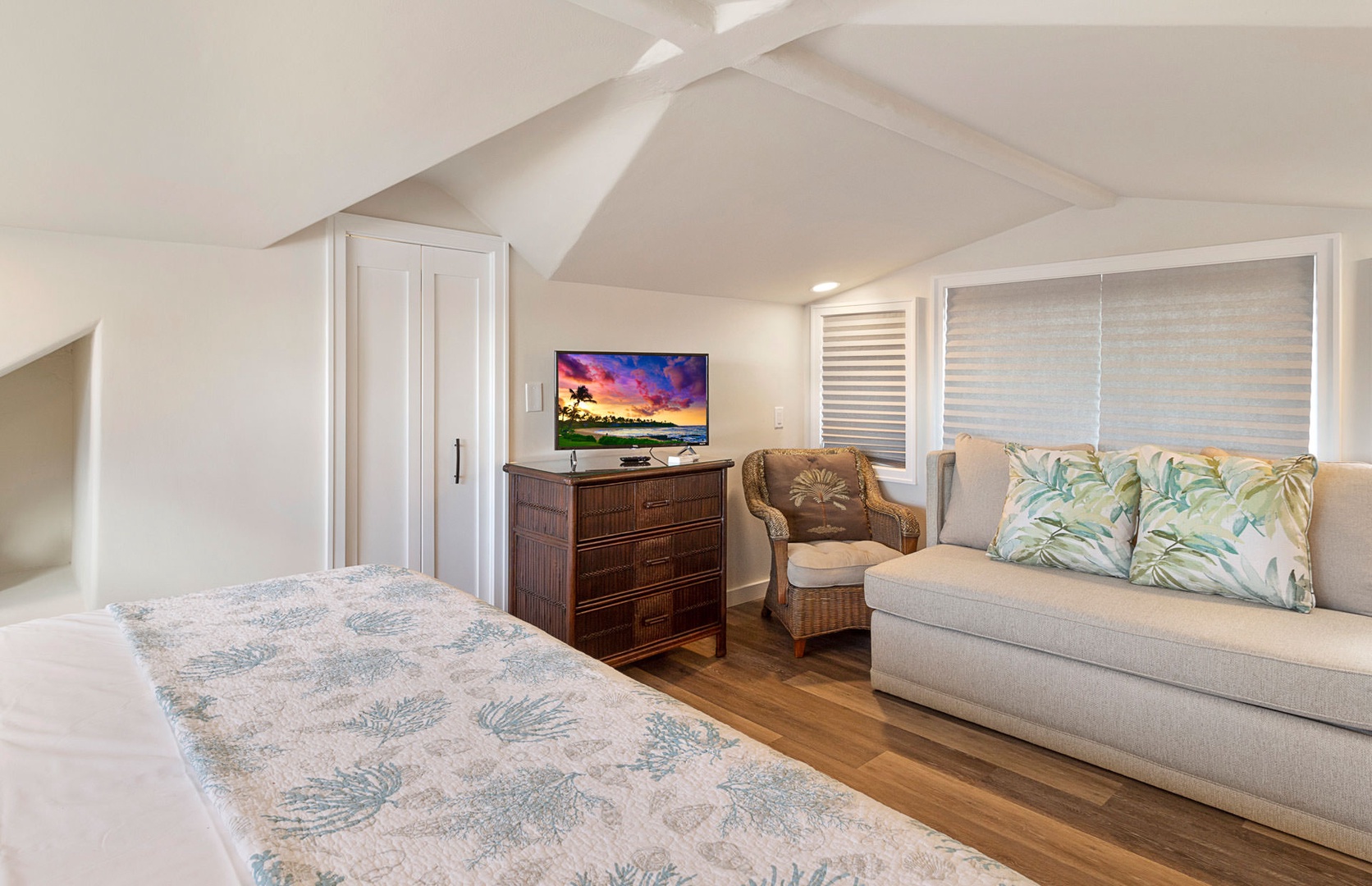 Lahaina Vacation Rentals, Puamana 240-3 - Relax in a well-lit bedroom featuring a king bed and a full size sleeper sofa.