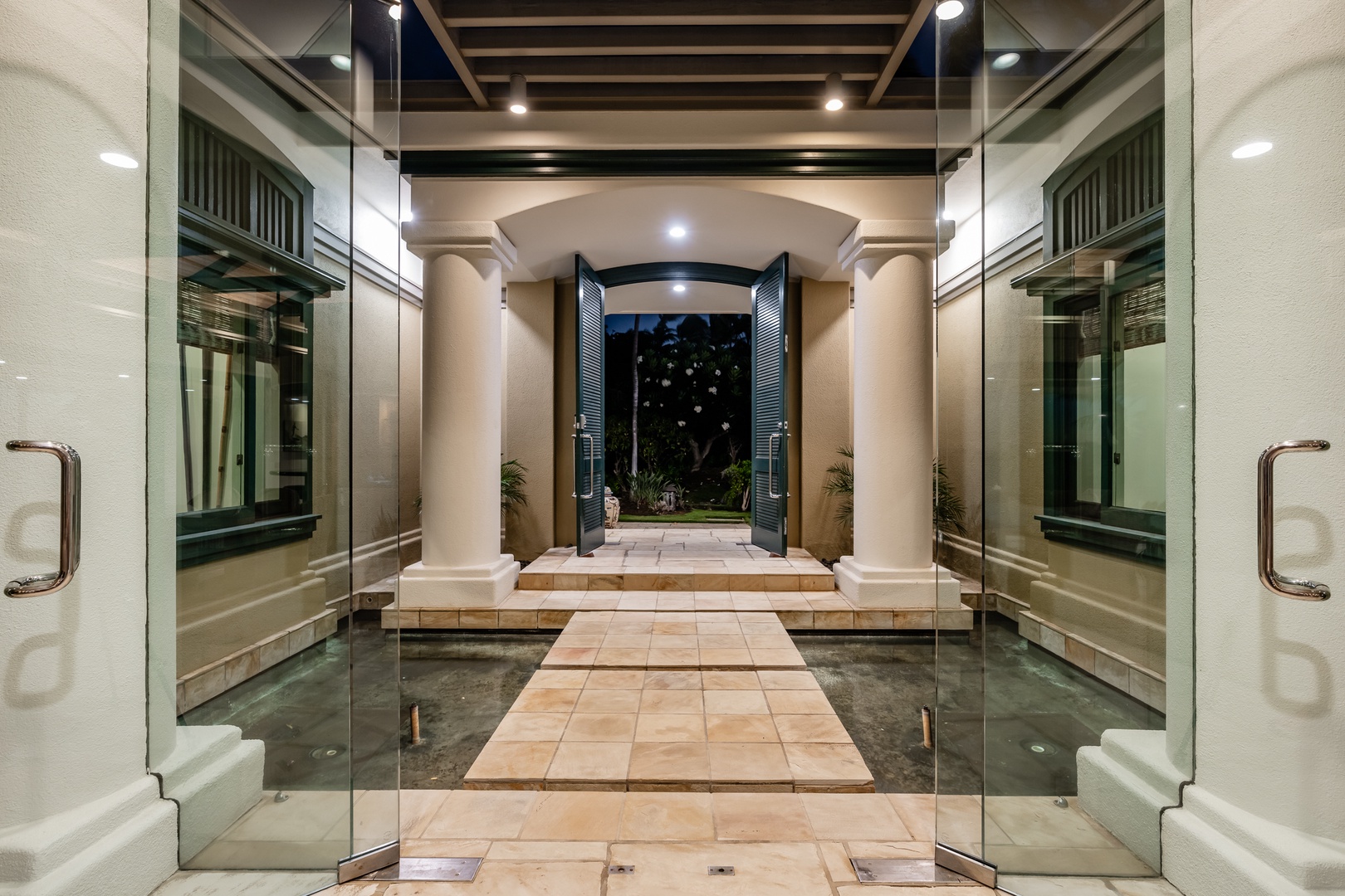 Kamuela Vacation Rentals, Champion Ridge 24 - Grand entrance with elegant columns and glass accents, creating a welcoming atmosphere as you step into the home.