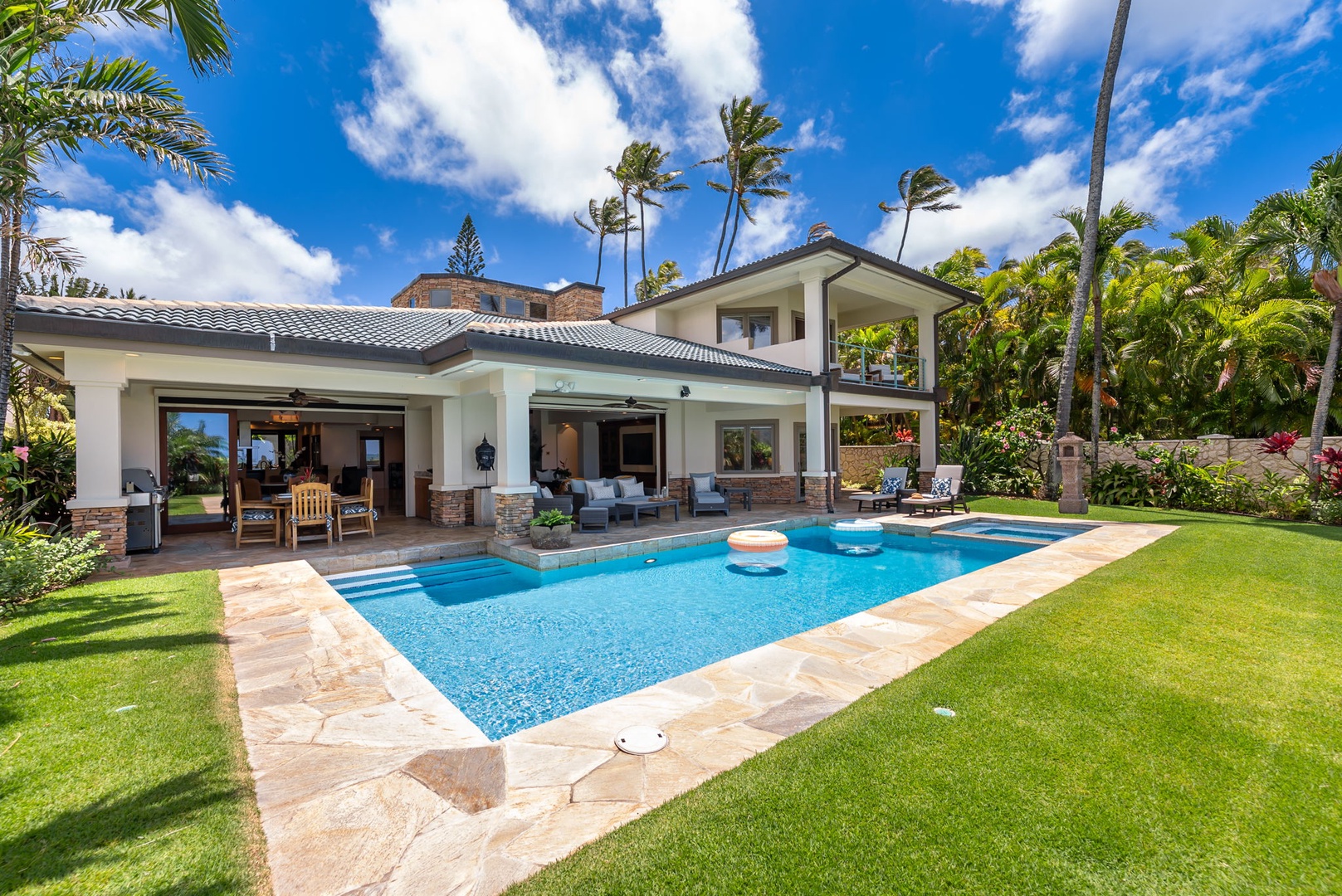 Honolulu Vacation Rentals, Maunalua Estate - Palm-lined grounds and bright blue skies create a picture-perfect backdrop for island living.