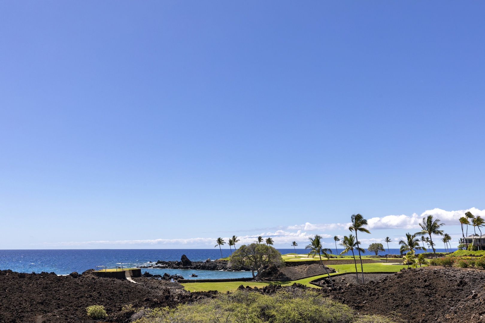 Kamuela Vacation Rentals, Mauna Lani Point E105 - Enjoy viewing the signtaure south course hole and the beauty of the coast.