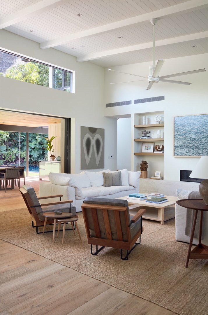Honolulu Vacation Rentals, Diamond Head Hillside Estate** - Designed for connection, the soaring great room offers comfortable seating, abundant natural light, and seamless access to the covered lanai beyond.