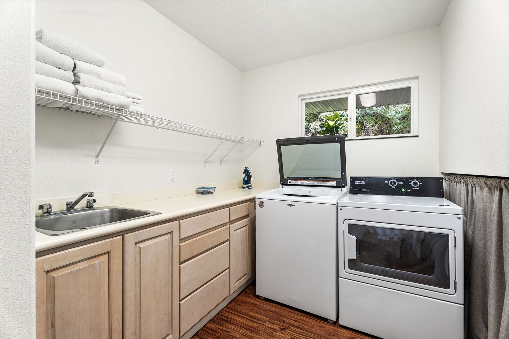 Kailua-Kona Vacation Rentals, Honu Hale - Laundry room makes extended stays effortless with full-size washer and dryer, plus counter space for folding.