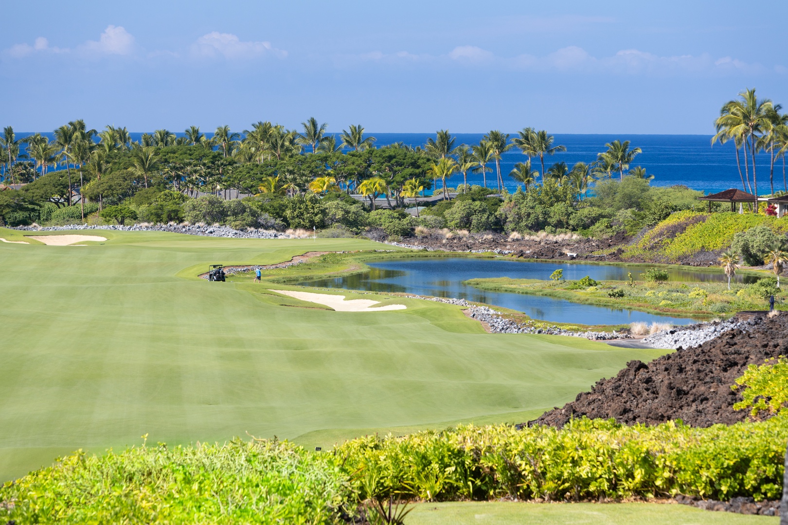 Kailua Kona Vacation Rentals, 3BD Waiulu Villa (111D) at Hualalai Resort - Championship golf course with ocean views, featuring tropical landscaping and pristine fairways along the coastline.