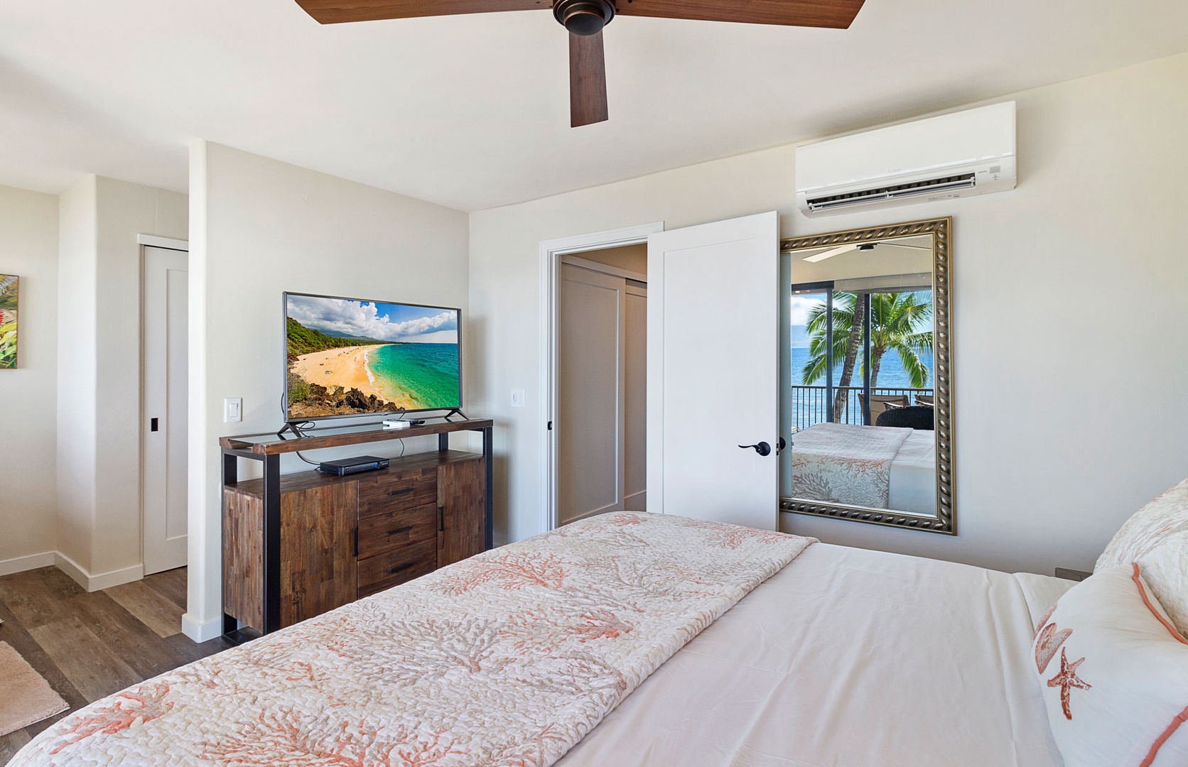 Lahaina Vacation Rentals, Puamana 240-3 - Wake up to soothing ocean views from the comfort of a cozy Primary bedroom.