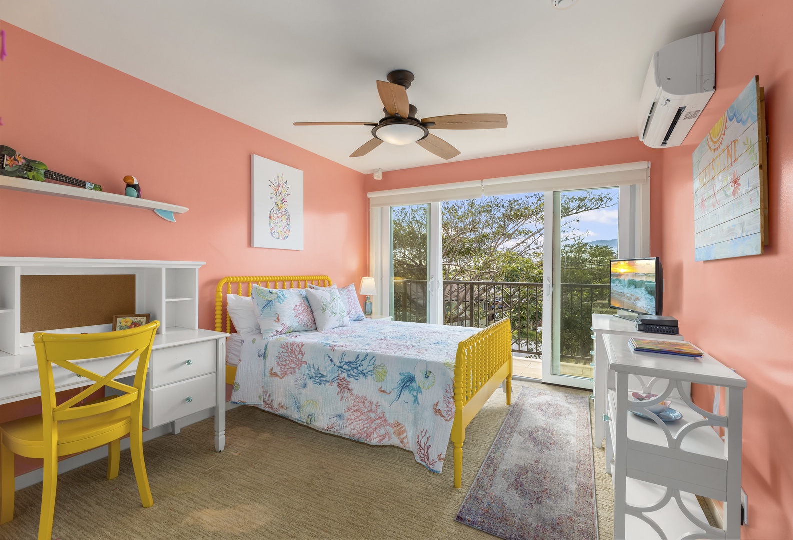 Waialua Vacation Rentals, Waialua Beachfront Getaway - Bedroom with lanai, view of the mountains, and Jack-and-Jill attached bathroom.