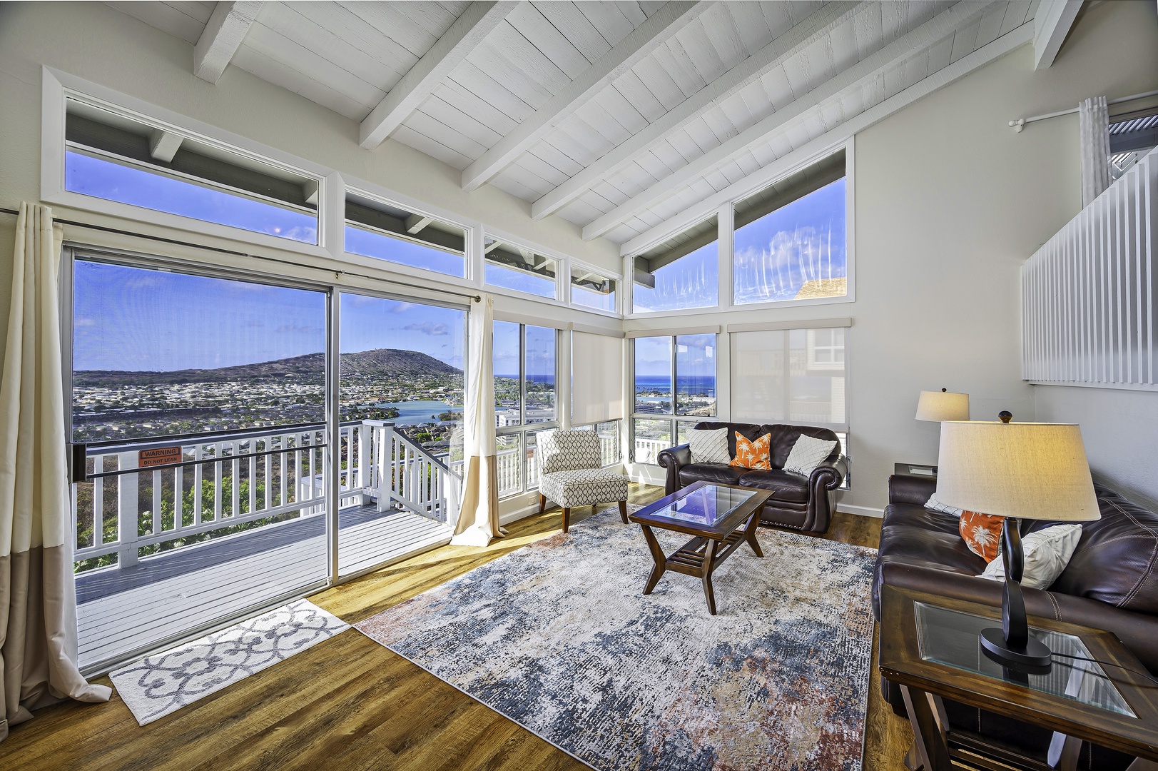Honolulu Vacation Rentals, Hale Malia - The living area is drenched in natural light and has stellar views thanks to the large windows and sliding glass doors