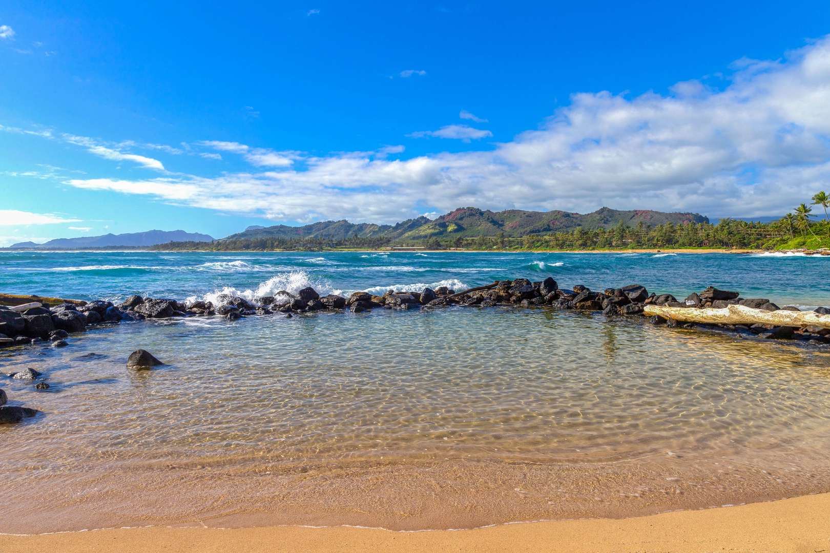 Kapa'a Vacation Rentals, Islander on the Beach #232 - Take a morning stroll down the beach, just a few steps from your home.