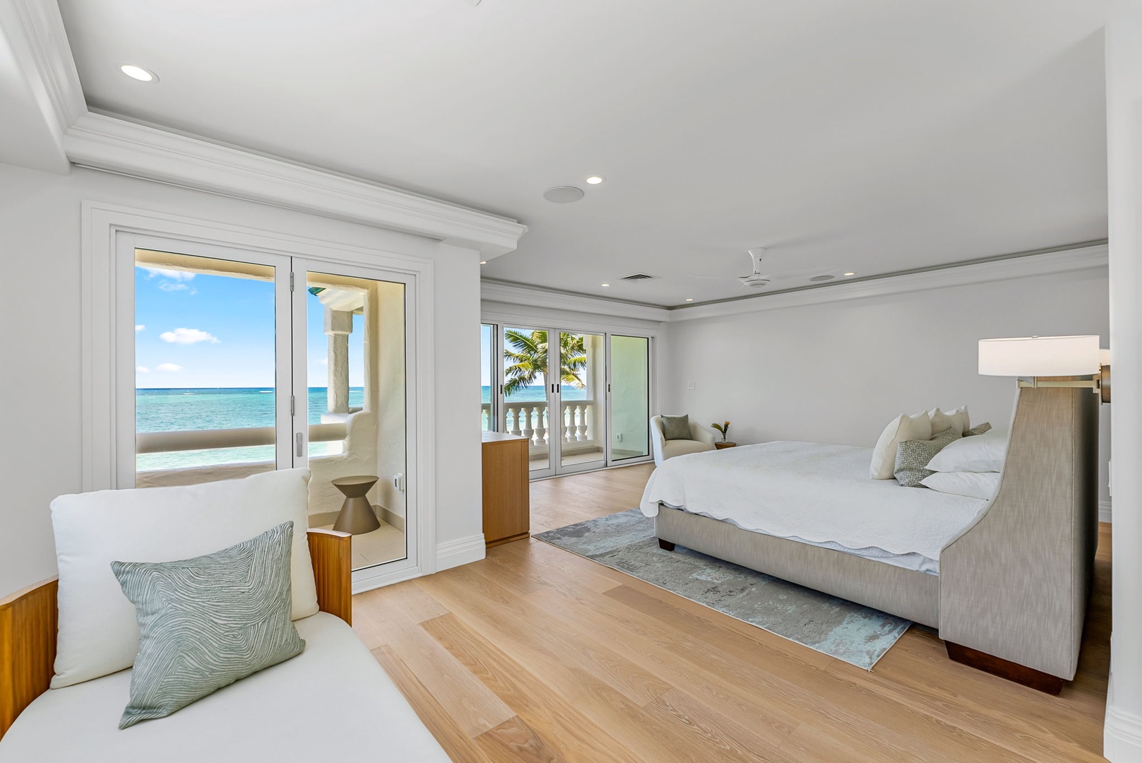 Kailua Vacation Rentals, Lanikai Sunrise Estate - Wake up to panoramic ocean views in this serene primary suite with king bed and private lanais.