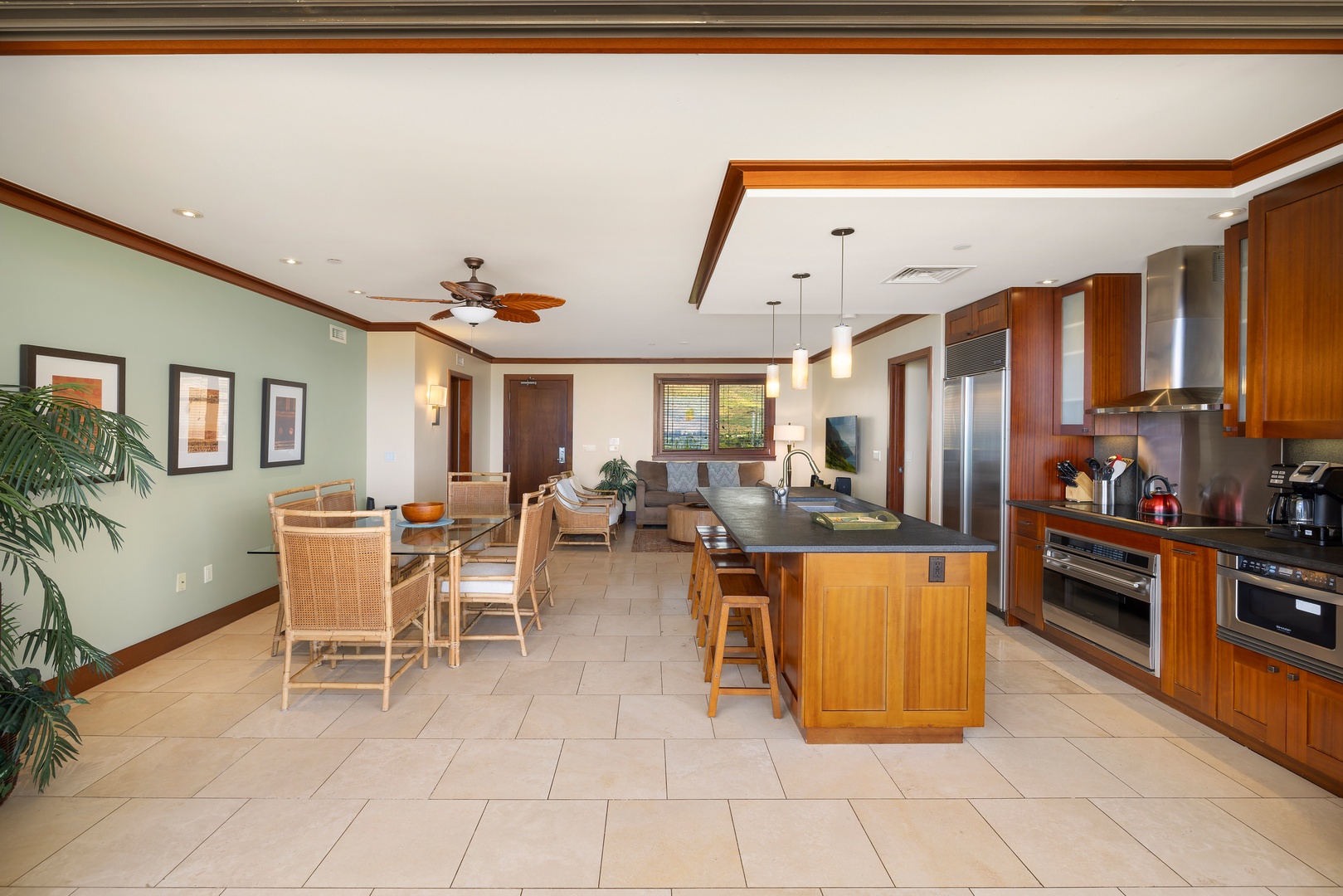 Kapolei Vacation Rentals, Ko Olina Beach Villas B901 - Your stunning open-concept kitchen flows seamlessly into elegant dining and living spaces, perfect for gathering and creating memories.