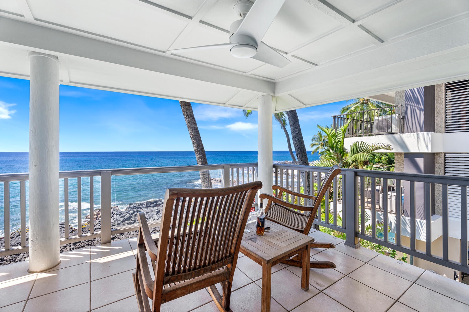 Kailua Kona Vacation Rentals, Hale Kai O'Kona #7 - Oceanfront dining and seating area perfect for coffee, cocktails, and evening conversations.