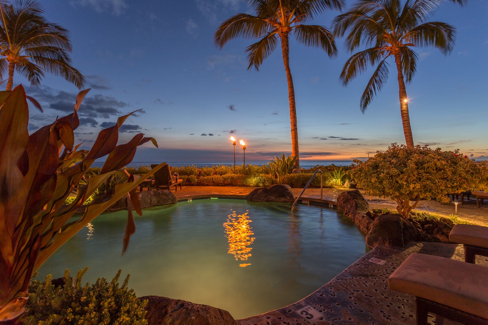 Waikoloa Vacation Rentals, 2BD Hali'i Kai (12C) at Waikoloa Resort - Yet another portion of the pool at twilight - a sand bottom hot tub is also on offer at this fabulous oceanfront amenities center.