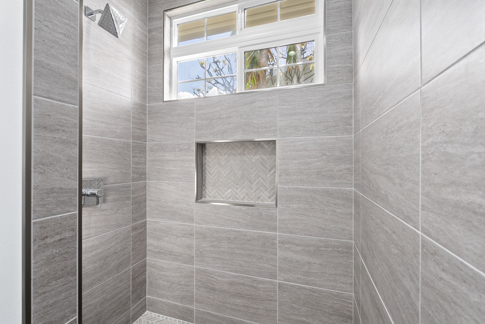 Waianae Vacation Rentals, Oceanfront Luxury Dream Estate - Beautifully tiled walk-in shower with niche shelving and natural light completes the guest wing.