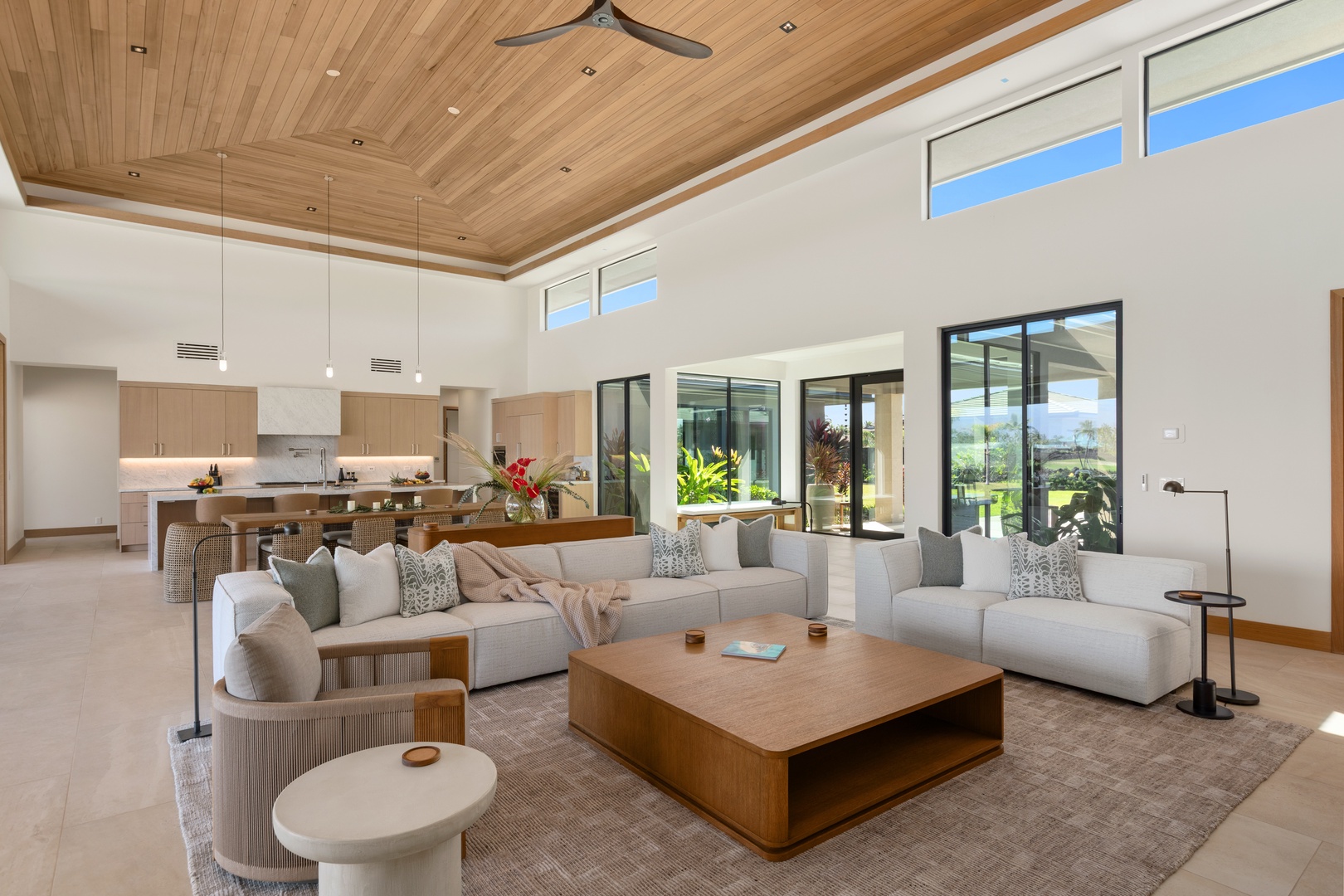 Kamuela Vacation Rentals, 5BD Mauna Lani Lux Ocean Estate (OE12) at One Ocean - Relax in this stunning open-concept living space where warm wood ceilings meet modern comfort, perfect for unwinding after exploring.
