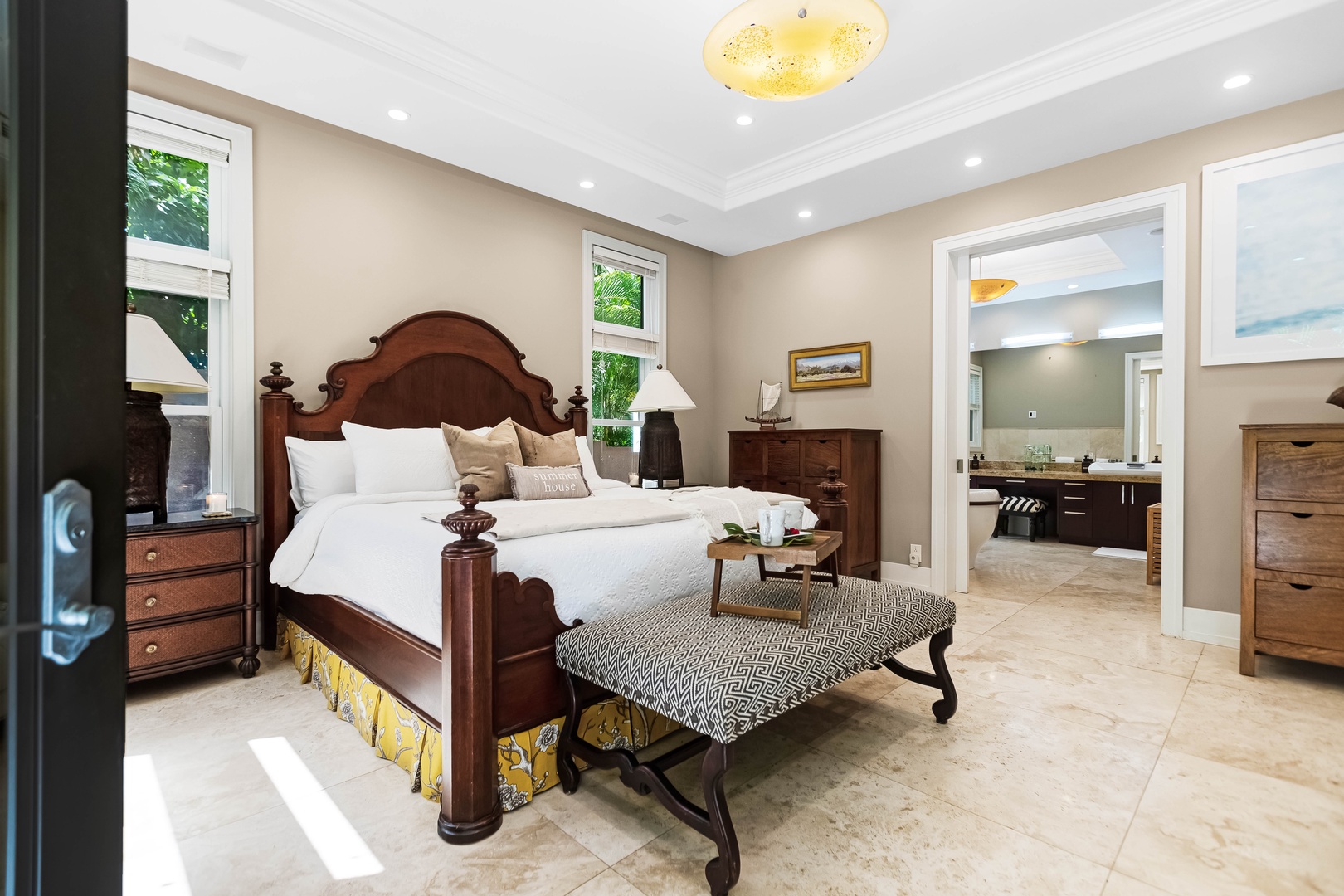 Honolulu Vacation Rentals, Pili Pono - California king suite with lounge bench and soft lighting.