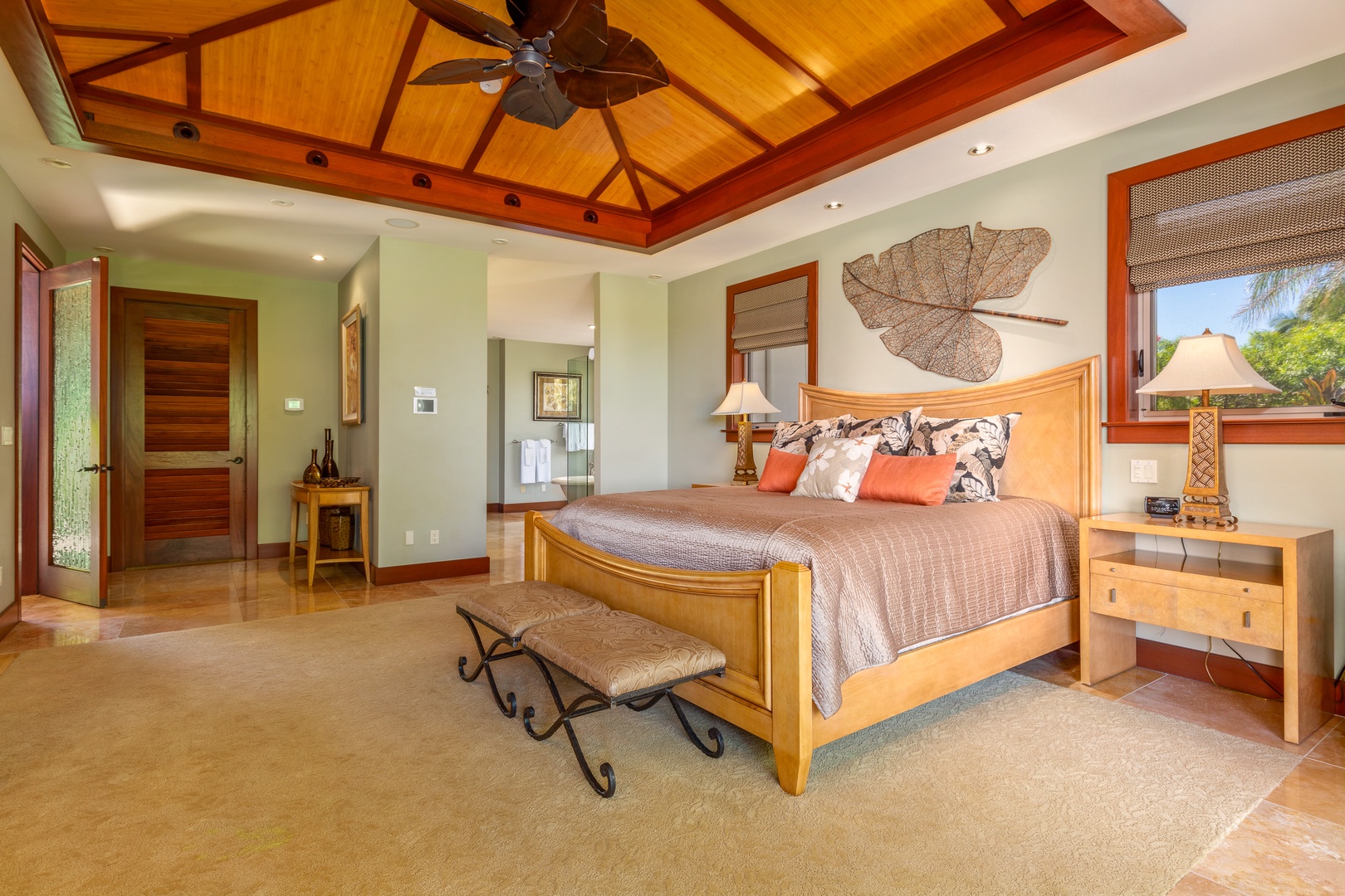 Kamuela Vacation Rentals, Champion Ridge Home - Unwind in the luxurious primary suite with a king bed, private lanai, and tropical garden access.