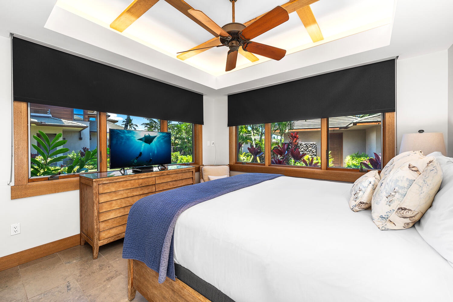 Kamuela Vacation Rentals, Laule'a at the Mauna Lani Resort #14 - King guest suite with rich wood accents and serene garden outlook.