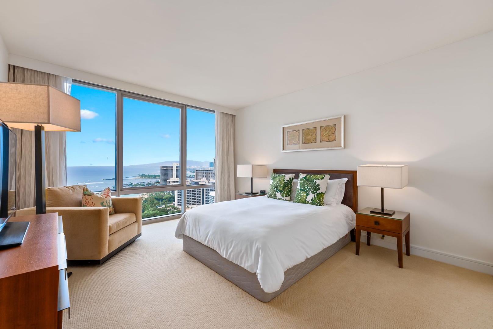 Honolulu Vacation Rentals, Kala'i 3203 - Primary bedroom with stunning floor-to-ceiling windows, offering incredible ocean views.