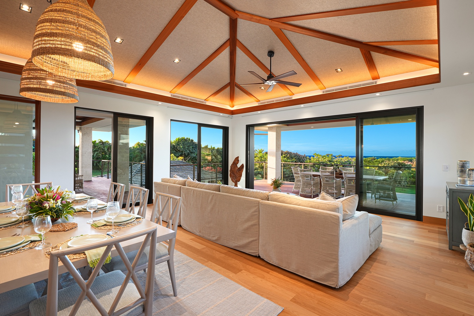 Koloa Vacation Rentals, Hale Kai'Opua - Experience seamless indoor-outdoor living with a grand entryway leading to scenic views.