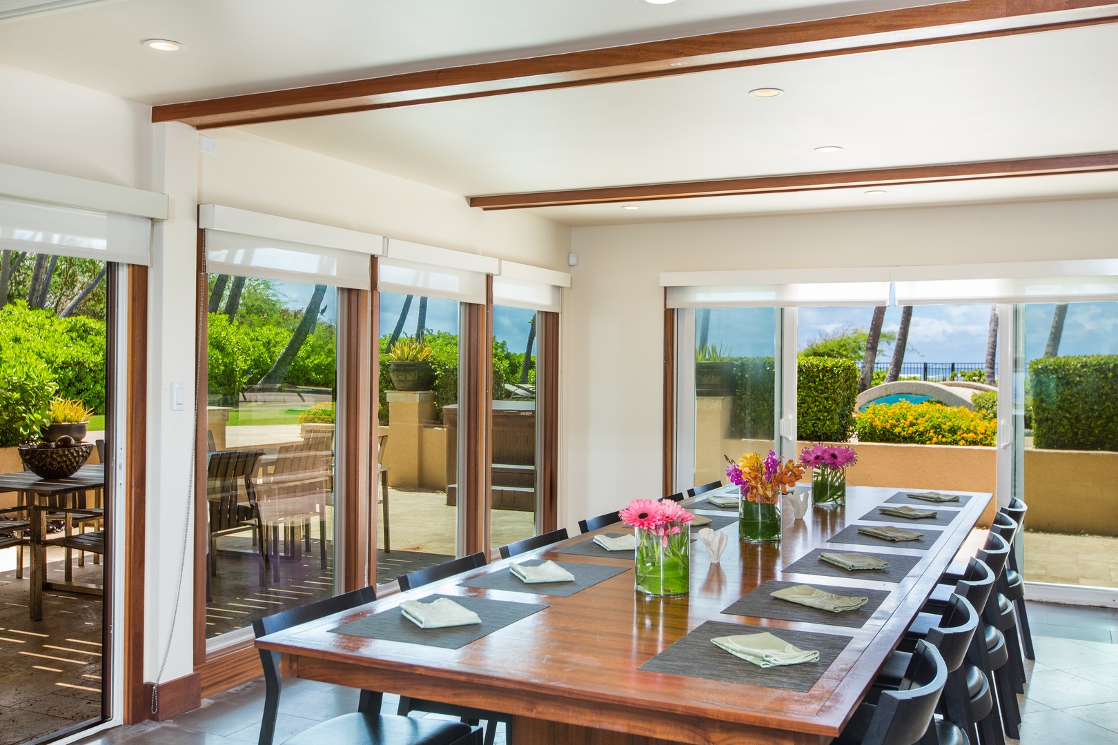 Honolulu Vacation Rentals, Kahala Mini Resort (5BR) - Dinner for the whole group, with sliding glass walls pulling the ocean to the table.