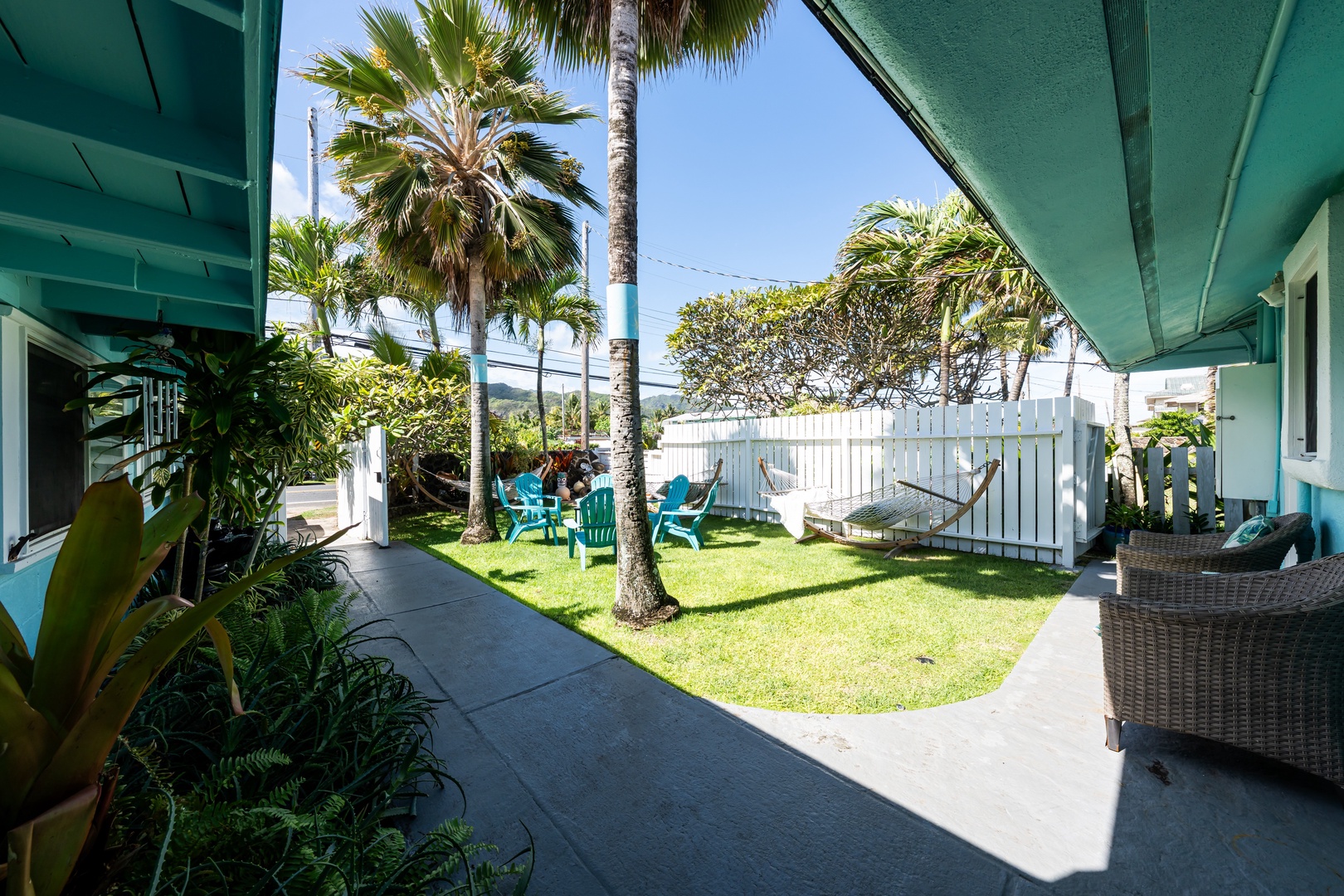Hauula Vacation Rentals, Private Beach Paradise - Private backyard oasis with swaying palms, a hammock, and space to unwind.