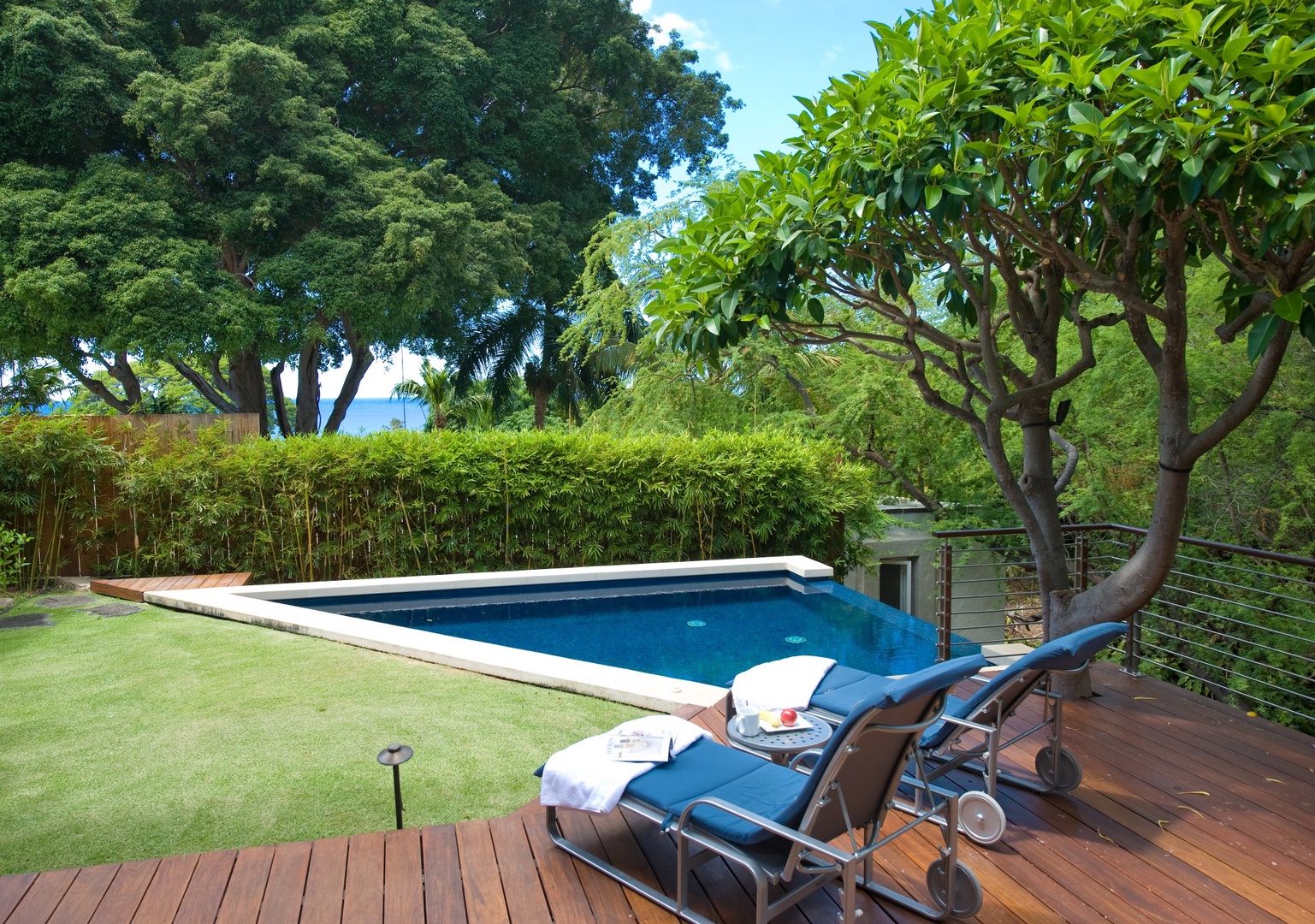Honolulu Vacation Rentals, Casa de Makalei - Lounge poolside or cool off in the private pool
