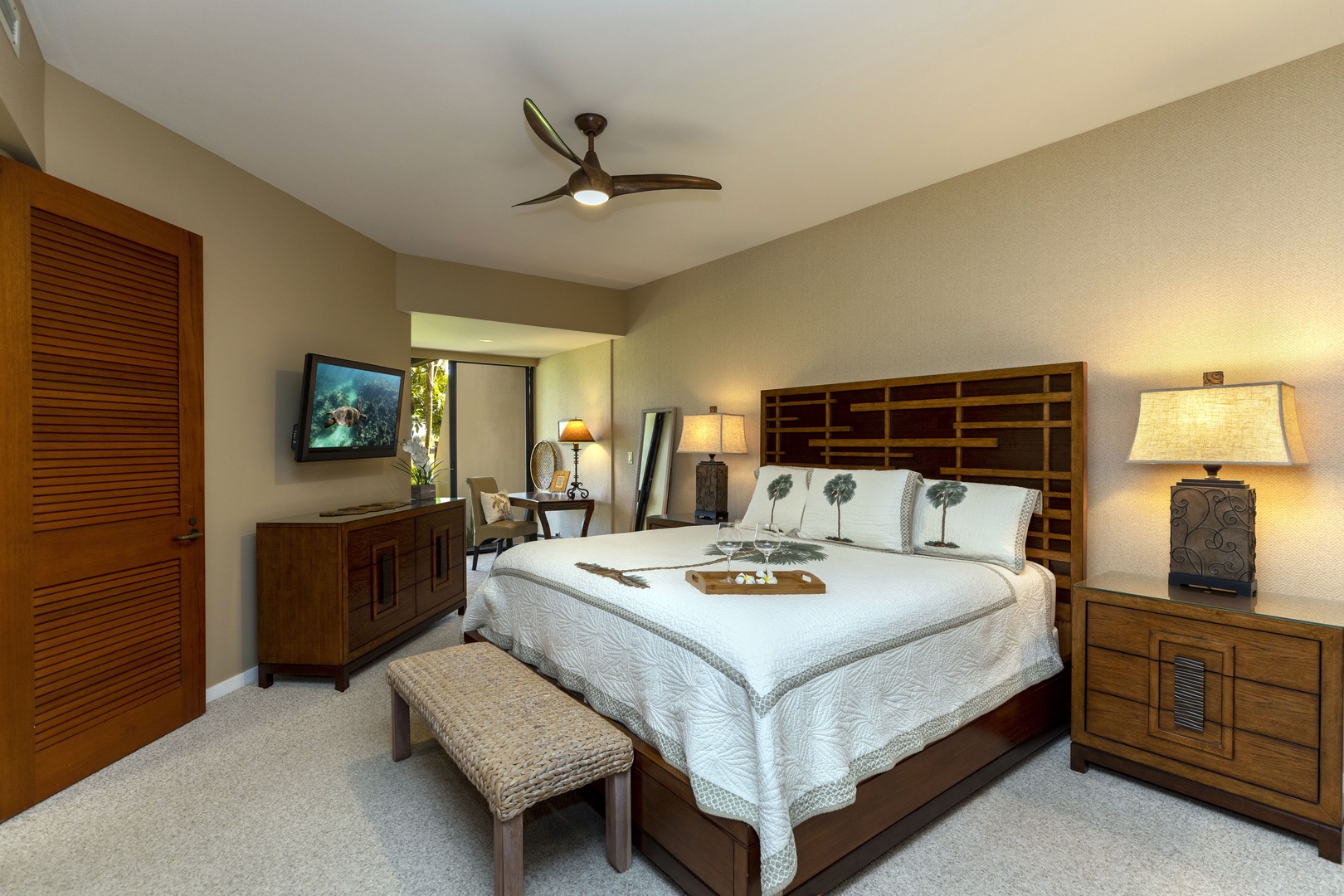 Kamuela Vacation Rentals, Mauna Lani Point E105 - The King bed is super comfy and has a door leading to the lanai.