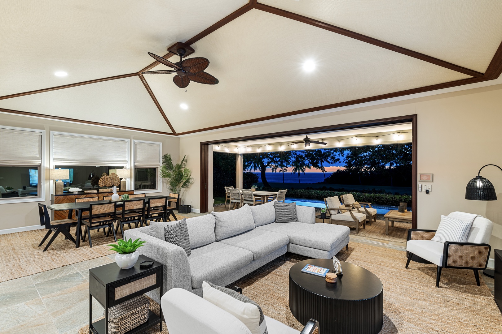 Kailua Kona Vacation Rentals, Holua Kai #27 - The great room glows warm once the sun drops and everyone drifts back inside.