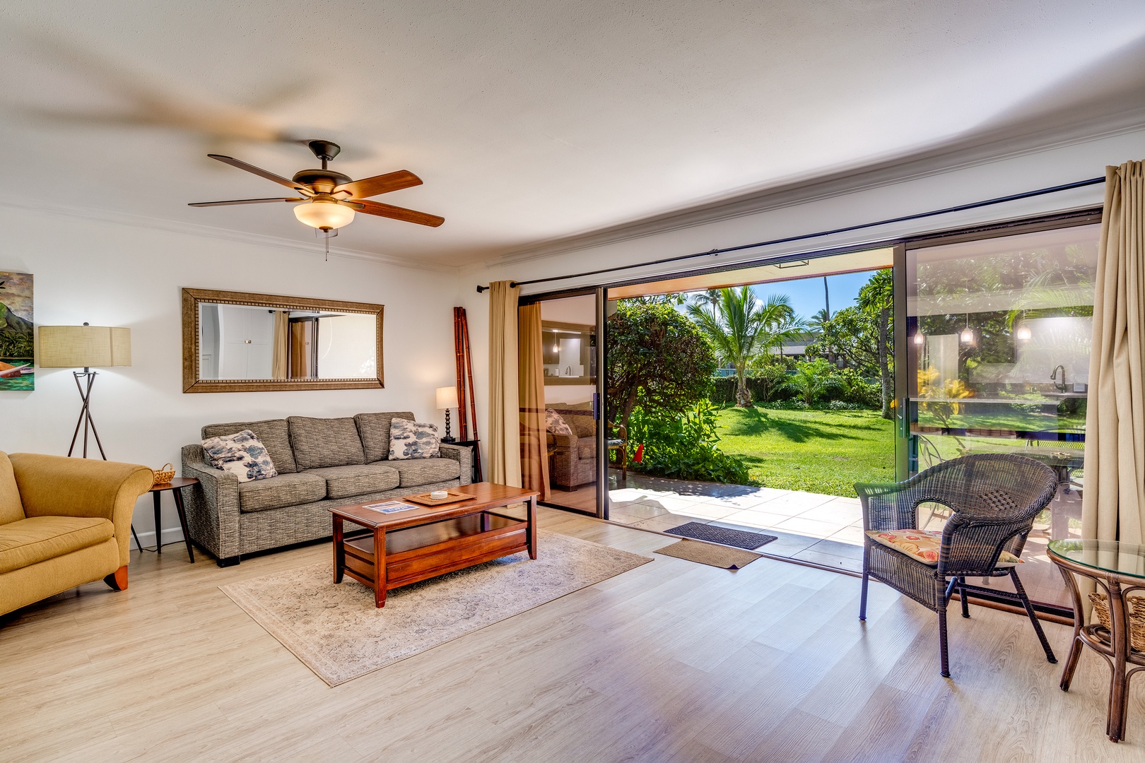 Kihei Vacation Rentals, Koa Resort 1B - Lanai connects to garden area with the pool steps away.