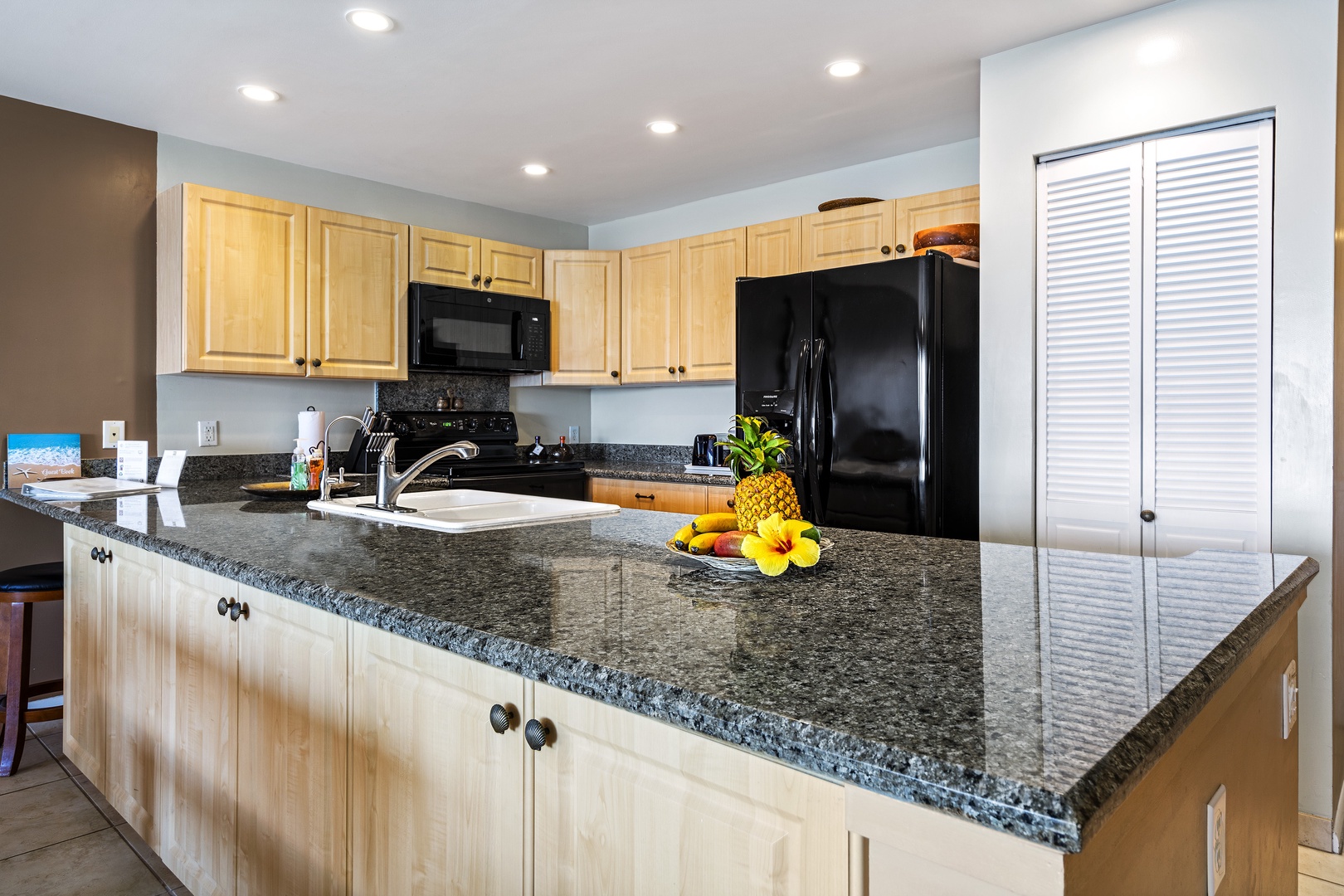 Kailua Kona Vacation Rentals, Sea Village 1105 - Fully equipped kitchen with breakfast bar
