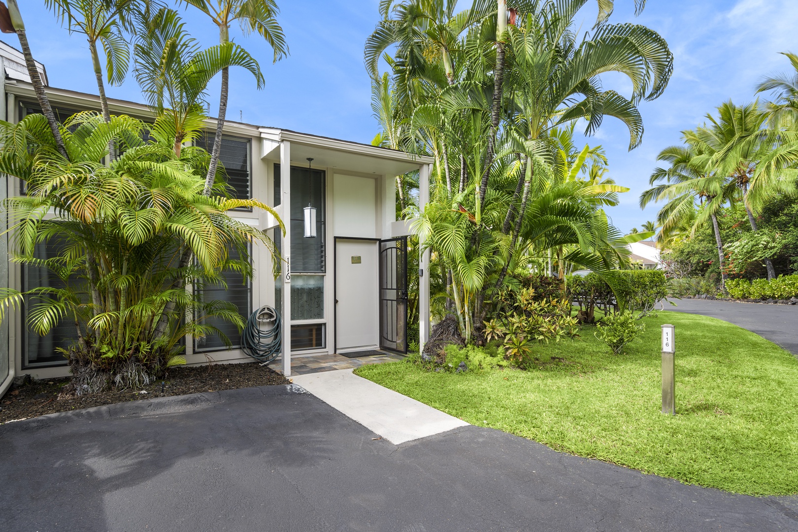 Kailua-Kona Vacation Rentals, Keauhou Resort 116 - Entry to the condo and assigned parking stall