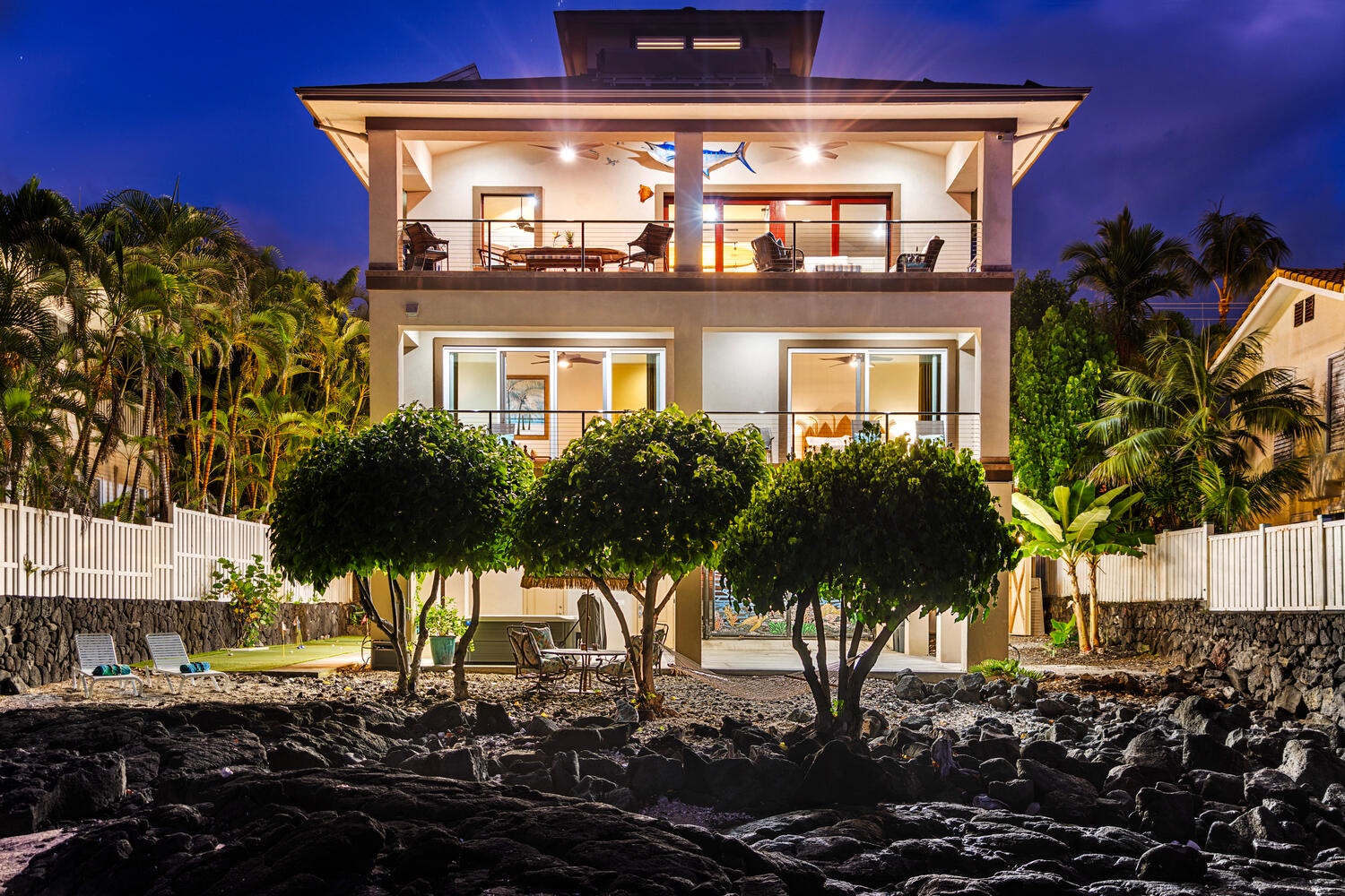 Kailua Kona Vacation Rentals, Kailani Vista - Dramatic uplighting showcases lanais on every level, hinting at the sunset and starlit views that await inside.